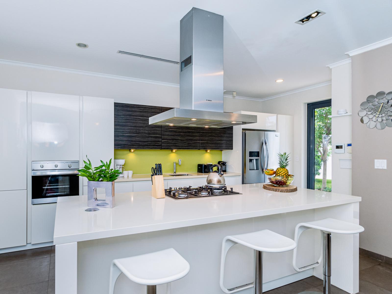 Superb Kitchen of the villa in Noord Aruba near California Lighthouse - Contemporary design with clean lines and minimalist aesthetics - Fully Equipped - Functional island for additional workspace