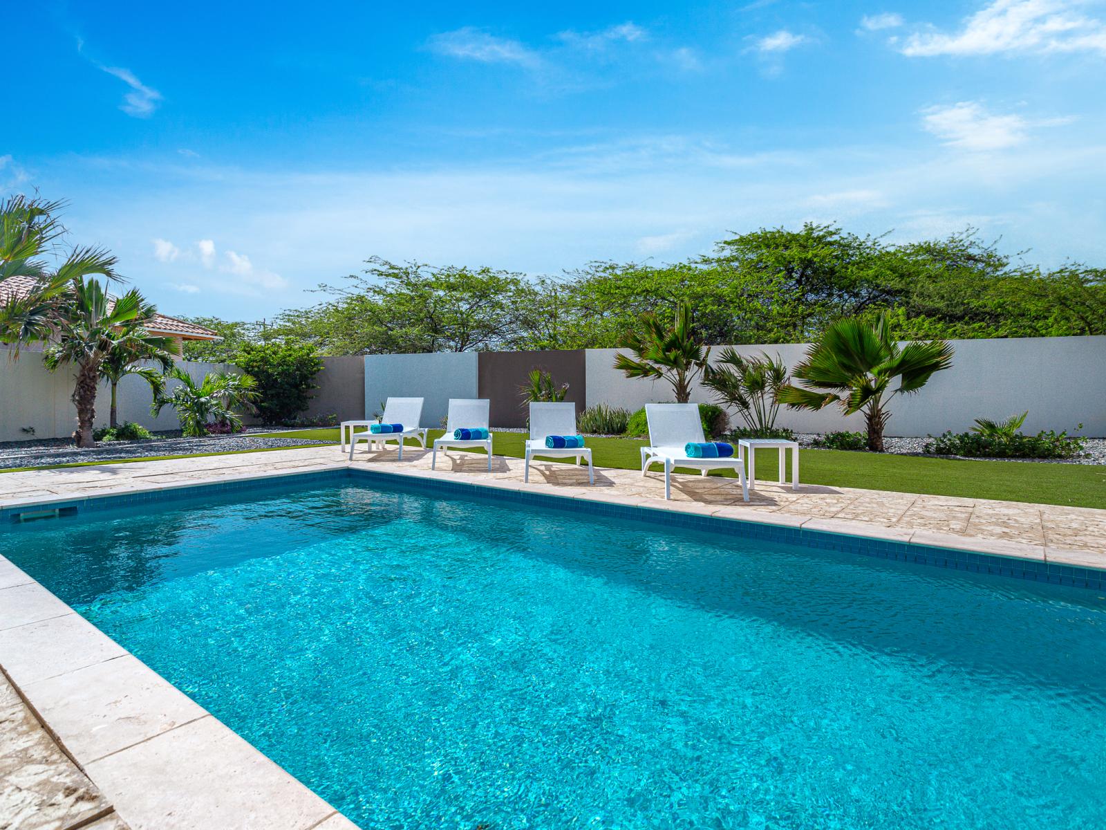 Private Pool of the Villa in Noord Aruba - Relax by the shimmering poolside oasis - Experience ultimate relaxation in our poolside paradise - Greenery for a secluded fee - Thoughtful lighting for day and night use