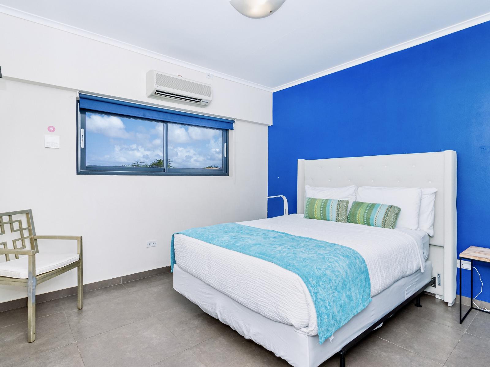 Experience comfort and convenience: the second bedroom boasts a plush queen bed and ensuite bathroom for your comfort.