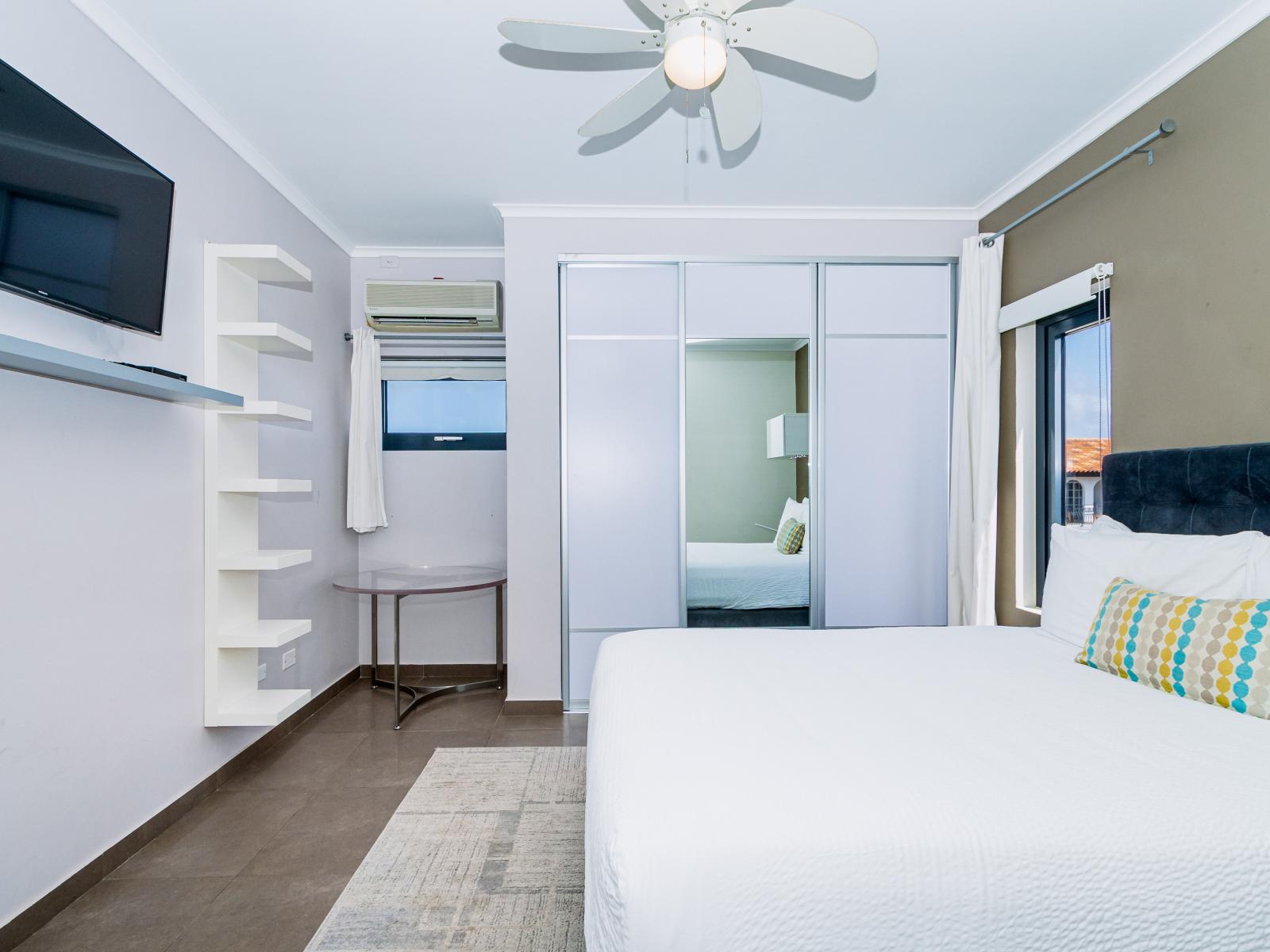 Escape to luxury: relax in the third bedroom, complete with a queen bed and ensuite bathroom for your comfort.