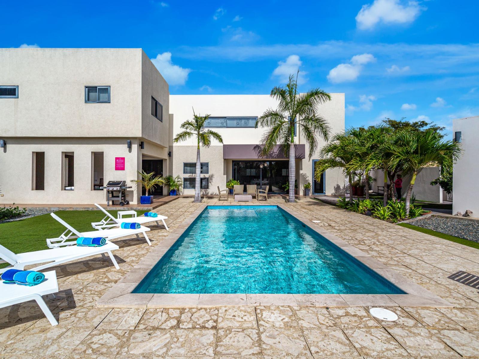 Unwind by the pool with plenty of lounge chairs for your comfort and convenience.