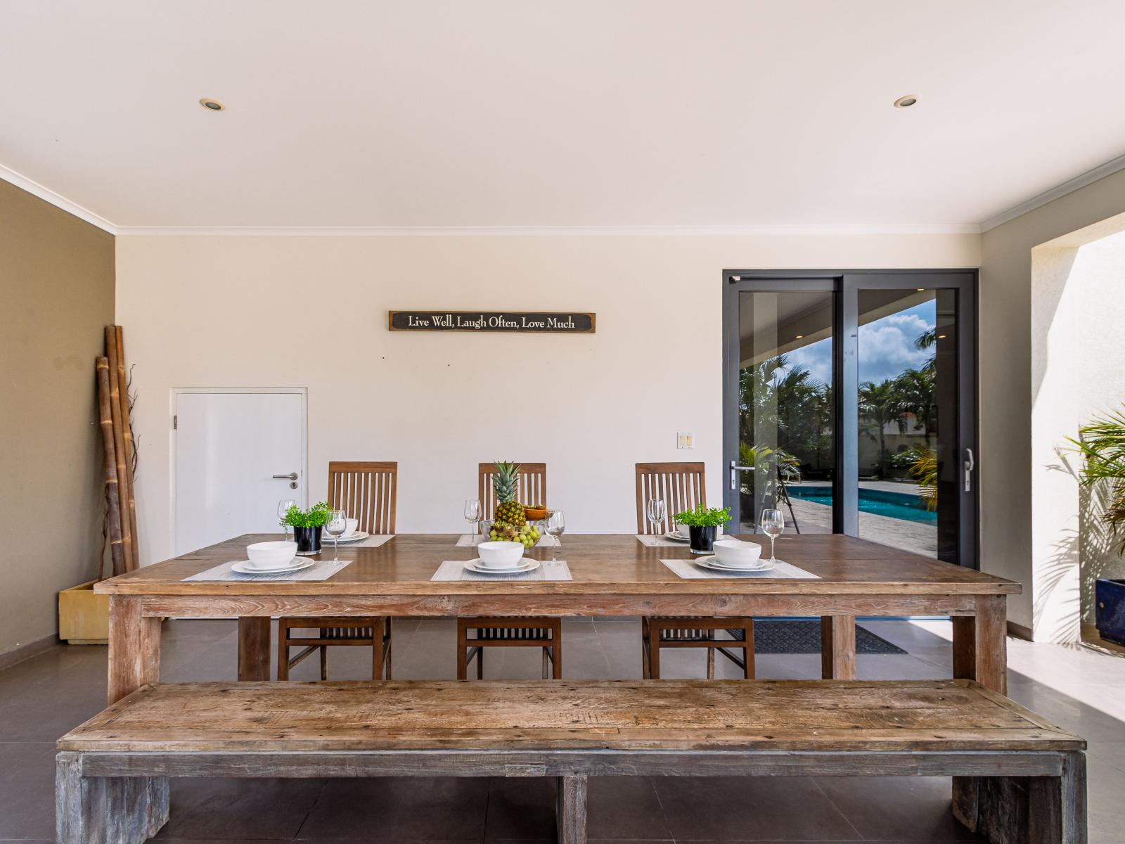 Alfresco dining at its finest: our outdoor kitchen area offers the perfect setting for cooking and entertaining under the open sky