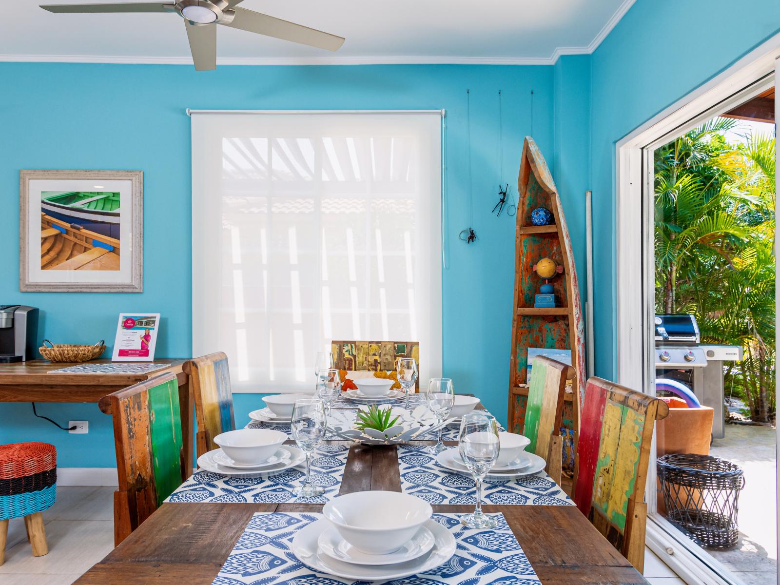 Enjoy meals at our dining table by the sliding doors, seamlessly connecting to the backyard for a perfect blend of indoor-outdoor dining experience.