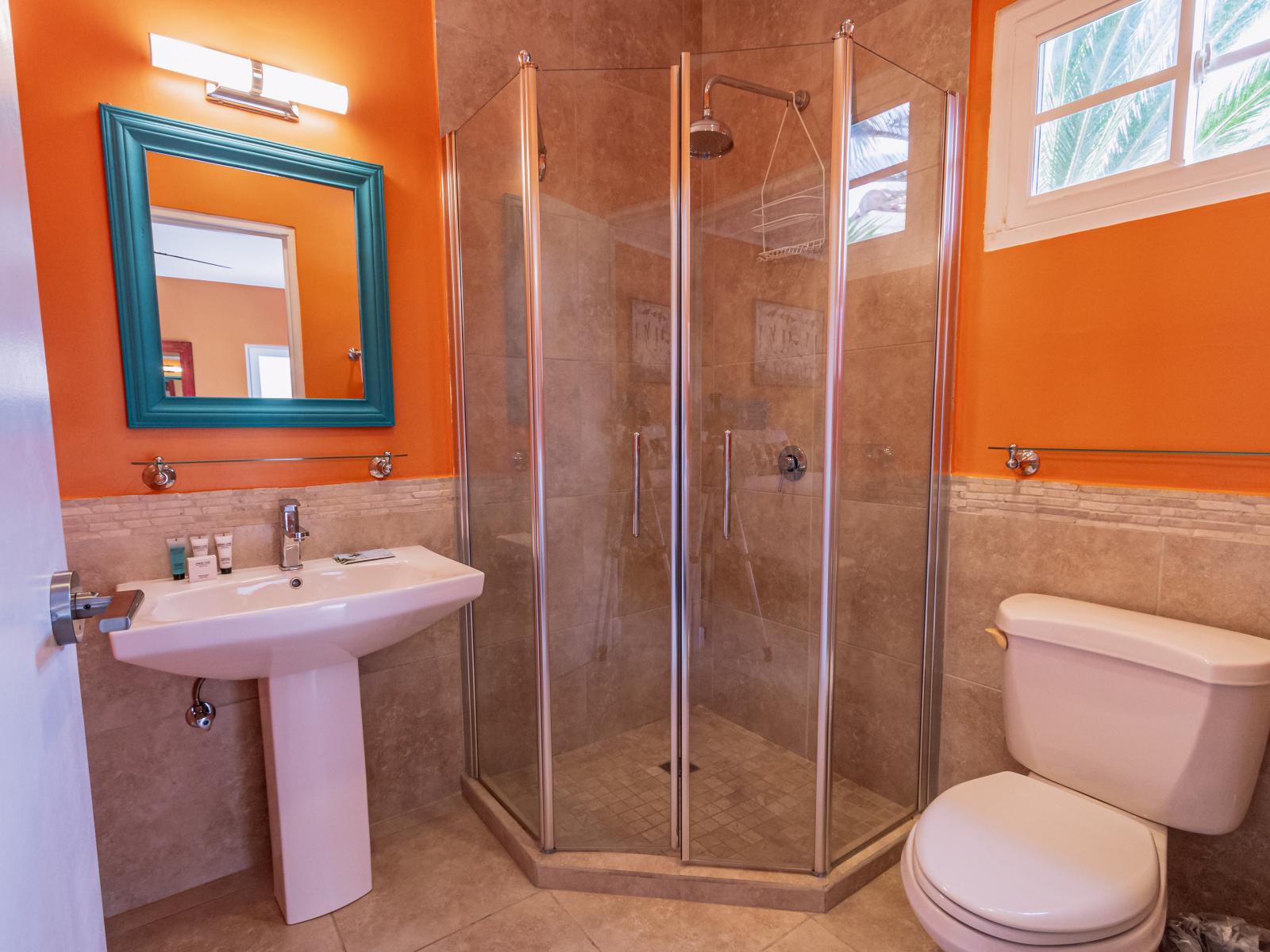 Bathroom 4, attached to Bedroom 4, features a convenient walk-in shower, offering privacy and comfort.