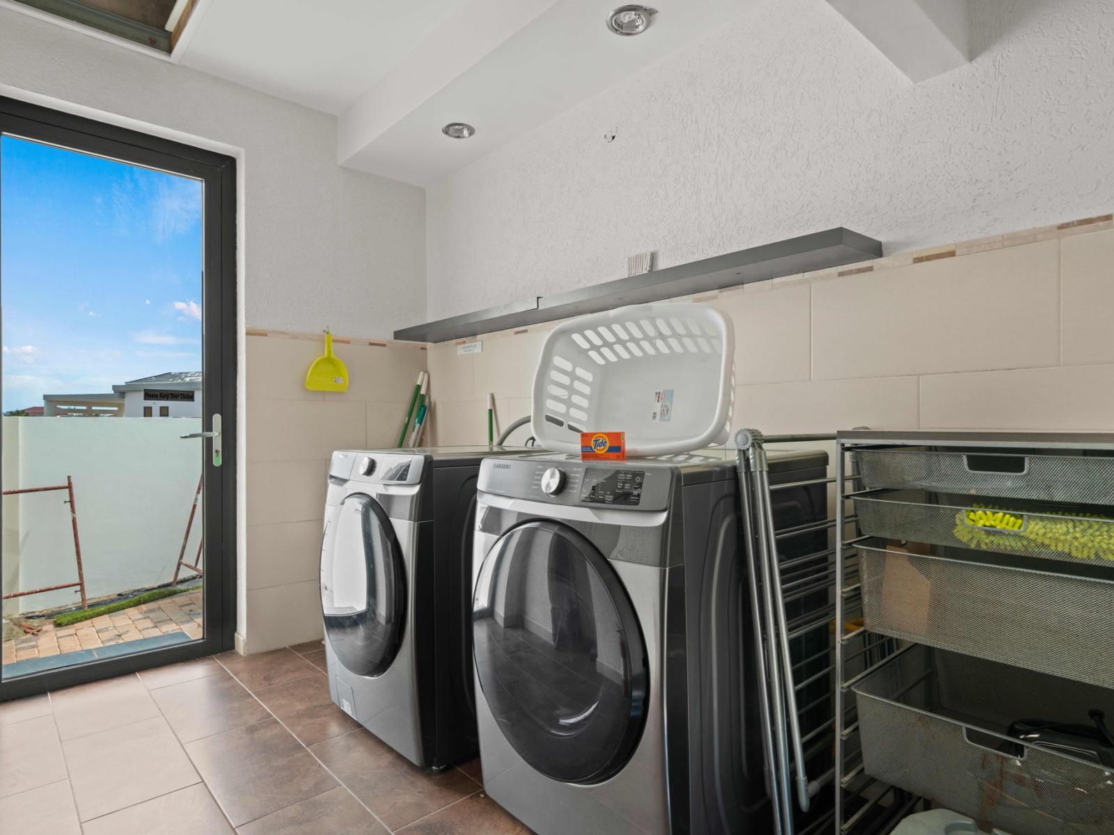 Laundry room with washer and dryer