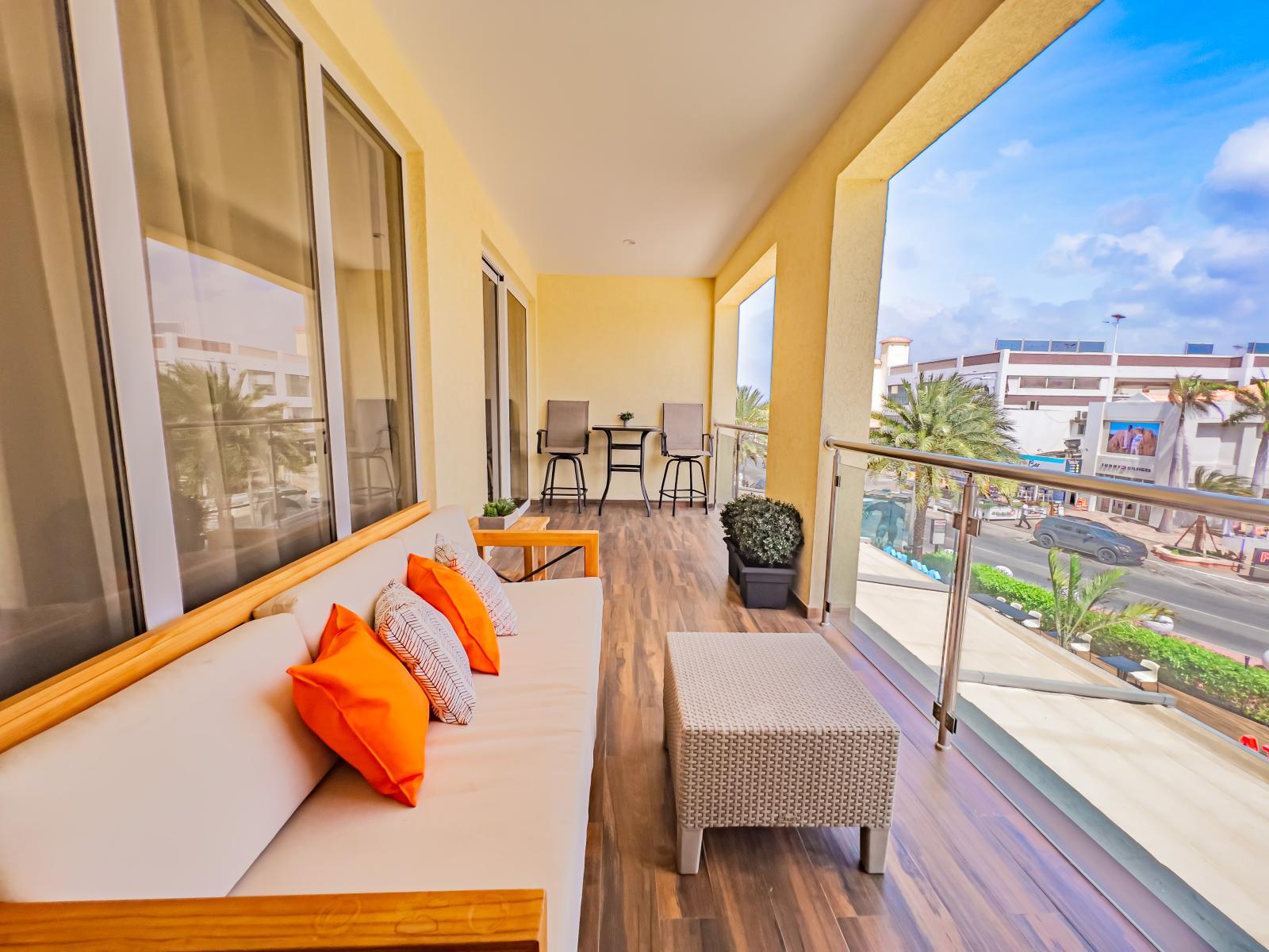 Exquisite Private Balcony of the 2BR condo in Noord Aruba - Dazzling Views from the private balcony - Stunning sitting space - Refreshing Environment