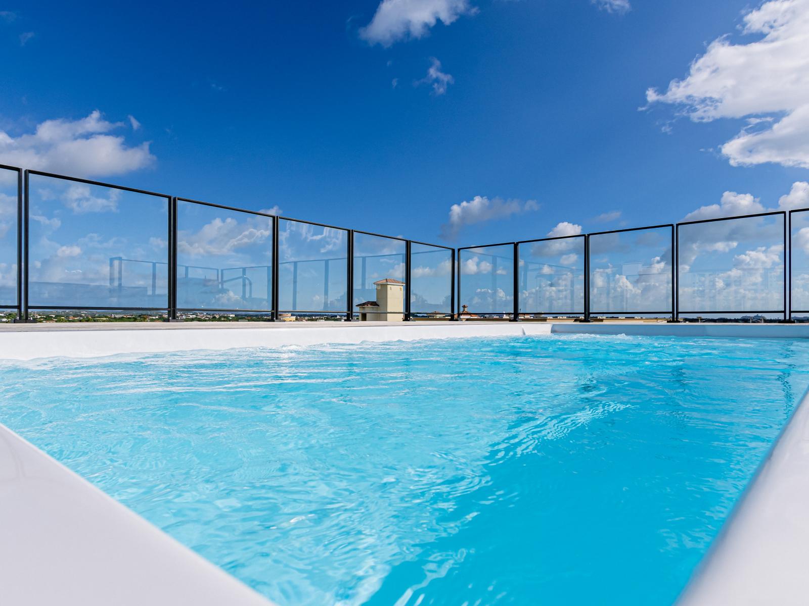 Relax and unwind in our stunning rooftop pool, available for guest use.