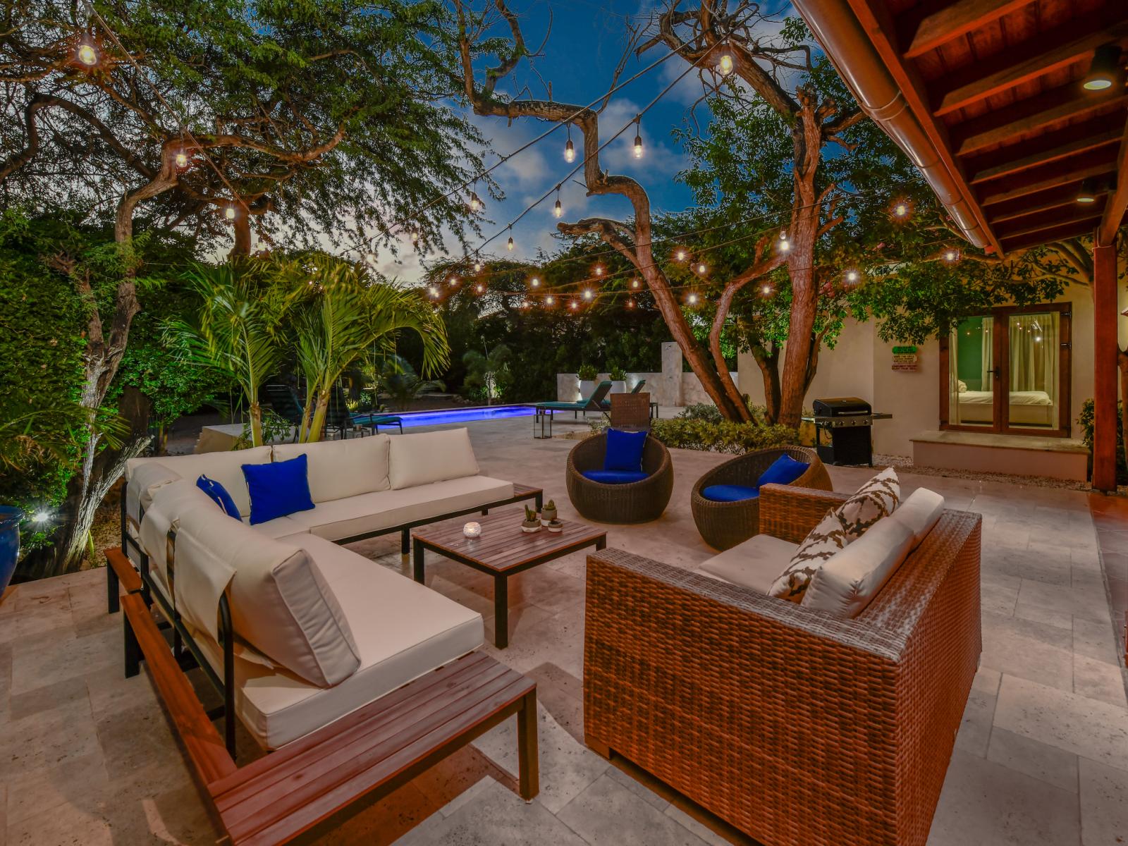 Relax in our cozy outdoor lounge area, where plush seating and ambient lighting create the perfect atmosphere for unwinding and enjoying the fresh air.