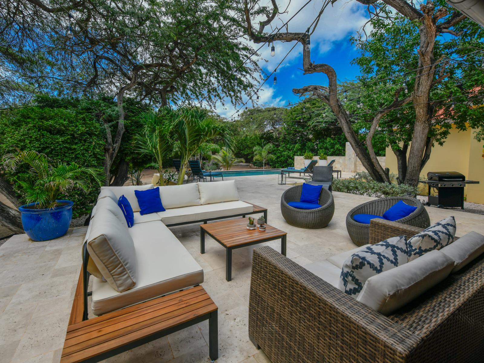 Fabulous Outdoor sitting area of the villa in Noord, Aruba - Beautiful pool facing sitting area - Elite sitting in soul enhancing environment  - Mesmerizing pool views - Majestic decored space - Refreshing Environment