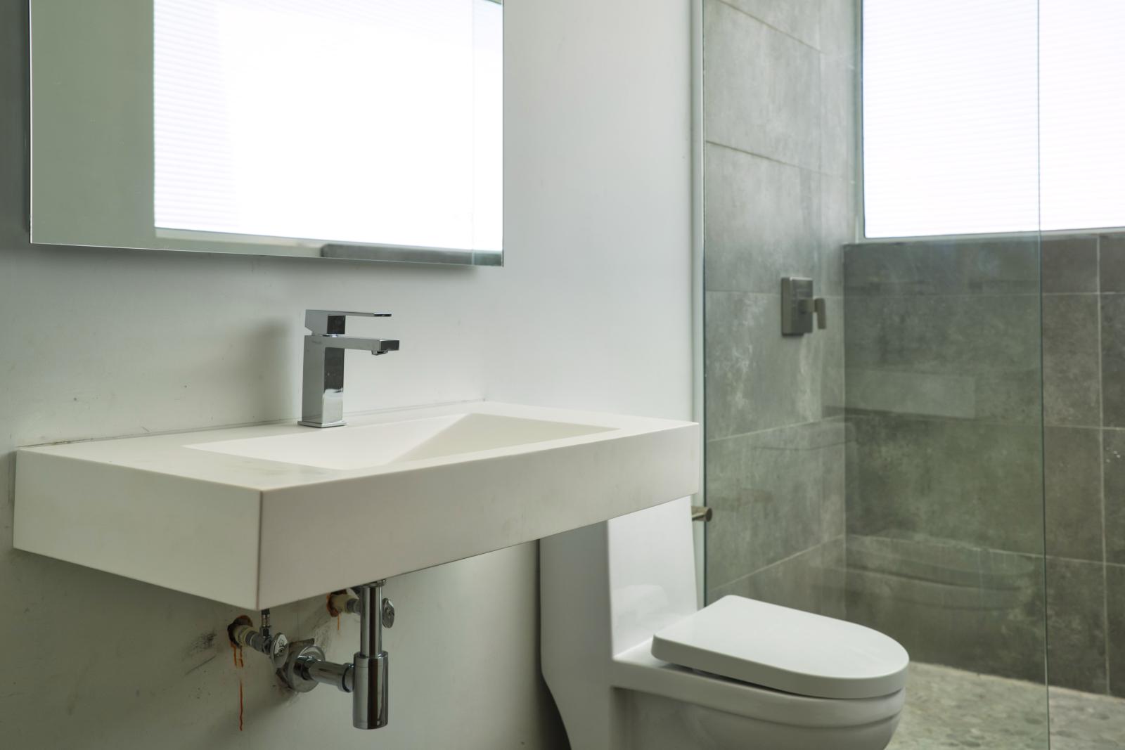 Step into Bathroom 2 and immerse yourself in modern design finishes – where sleek lines and chic details create a luxurious atmosphere for your daily routines.
