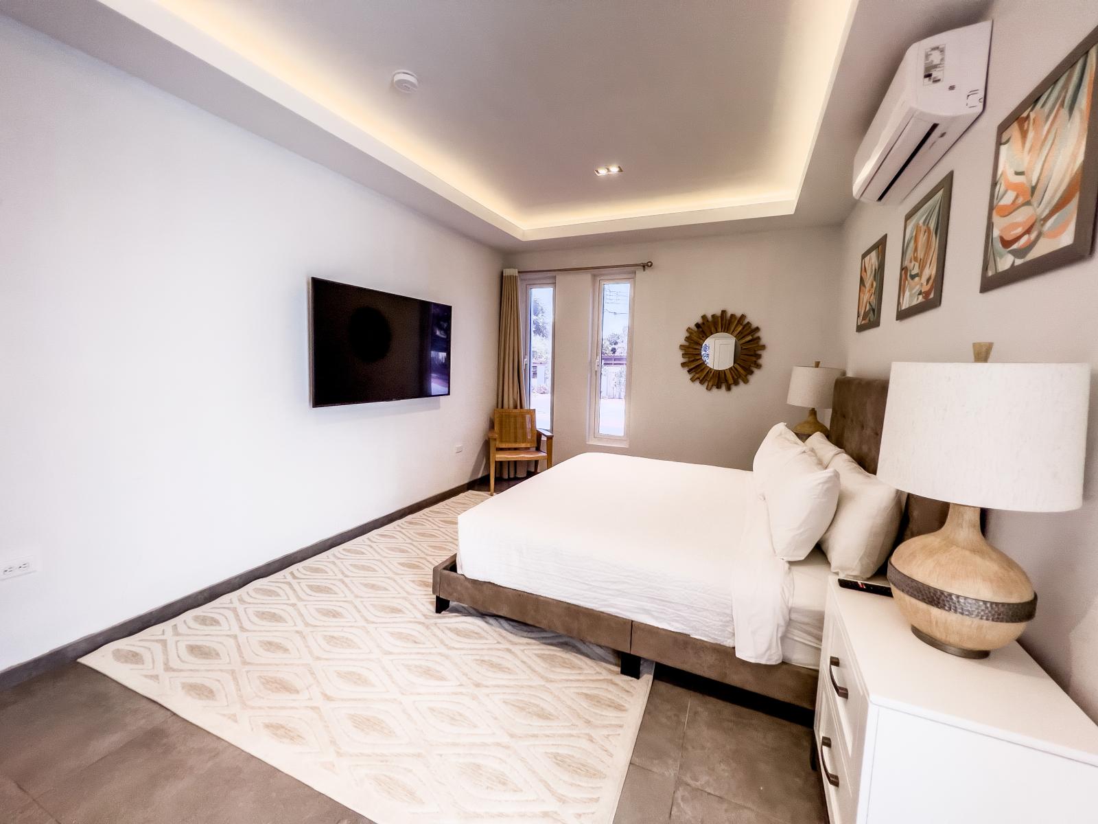 Experience the epitome of comfort in Bedroom 6, featuring a spacious King size bed and an attached bathroom – where indulgence meets convenience for a truly regal stay.