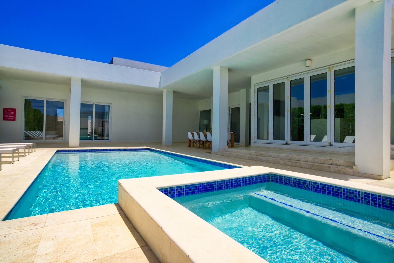 Dive into relaxation with our refreshing pool and inviting hot tub – the perfect duo for unwinding after a day of adventure or simply soaking up the sun in style.