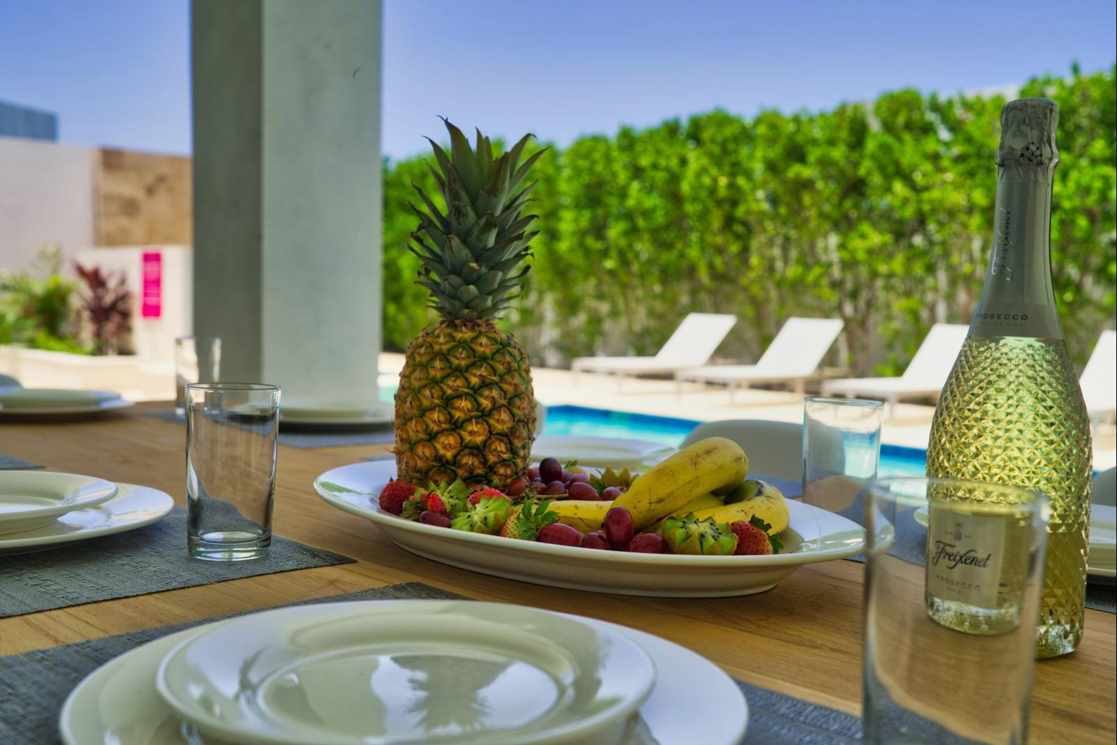 Savor every bite poolside with your loved ones – where delicious meals, laughter, and cherished moments blend seamlessly under the warm sun.