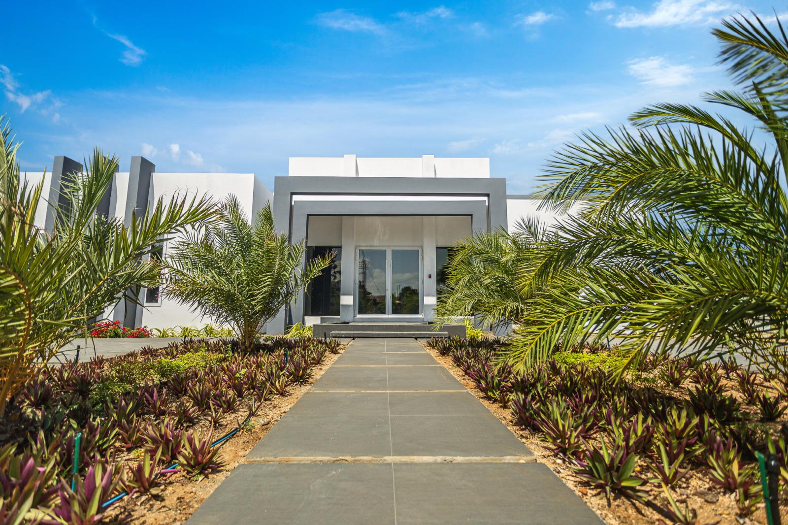 Step through the inviting front door of our villa, where comfort and elegance await to greet you with open arms.