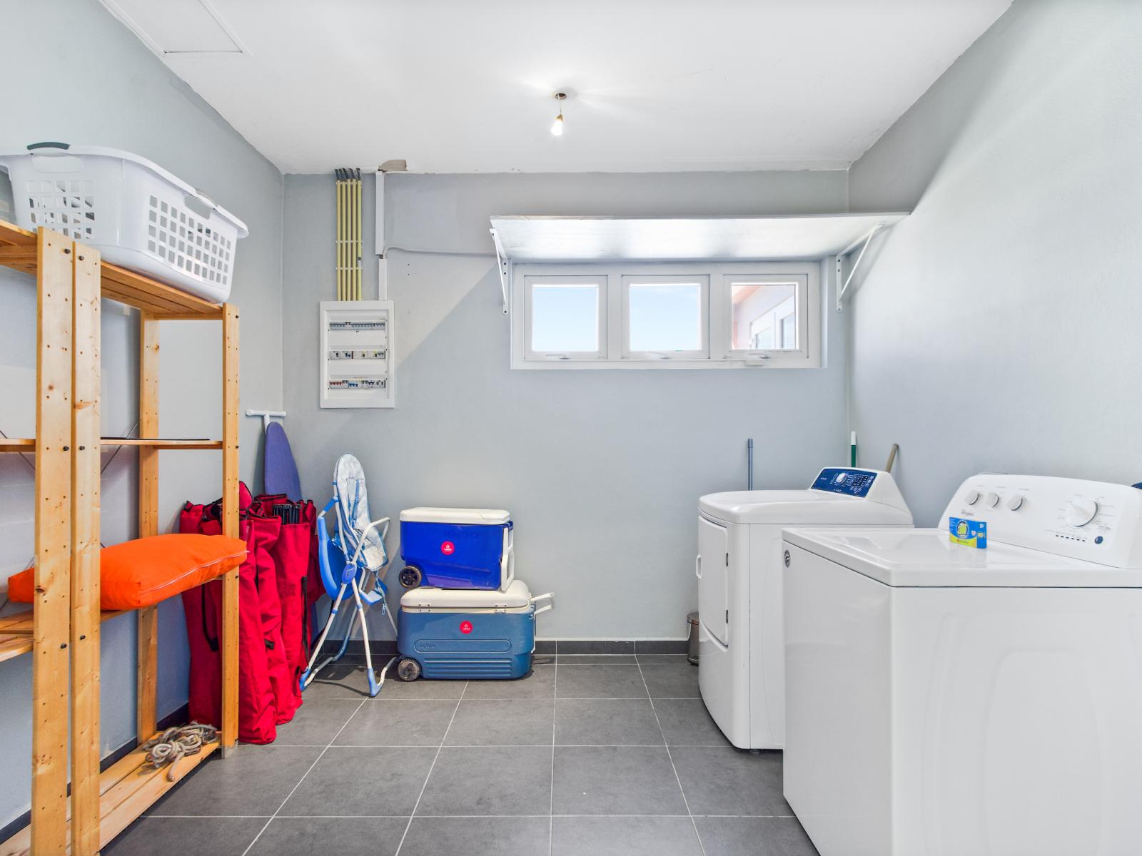 Stay fresh and clean with our fully equipped laundry area, available for your convenience