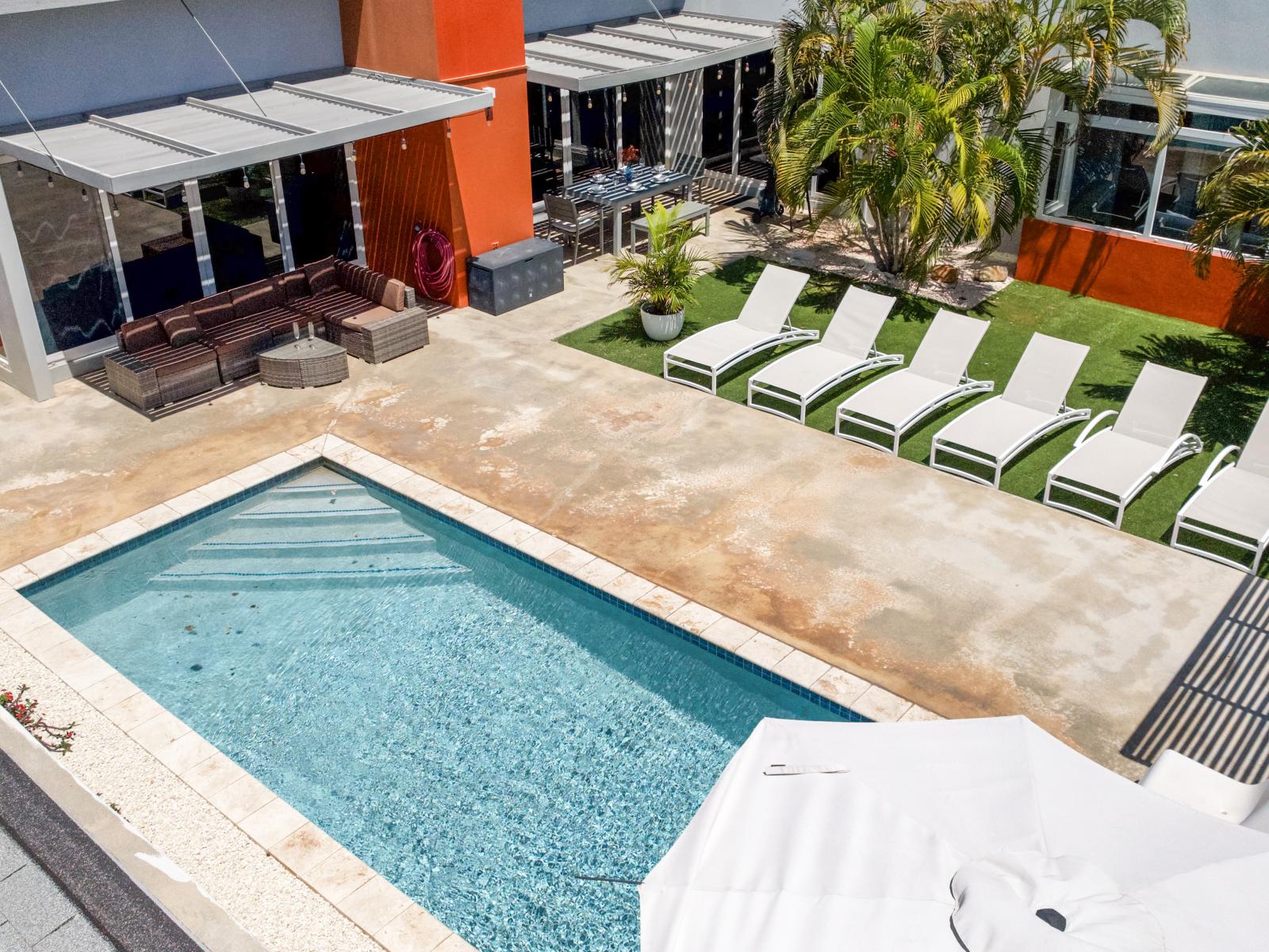 Find your oasis: our outdoor swimming pool and sun lounges create a tranquil escape for rest and relaxation.