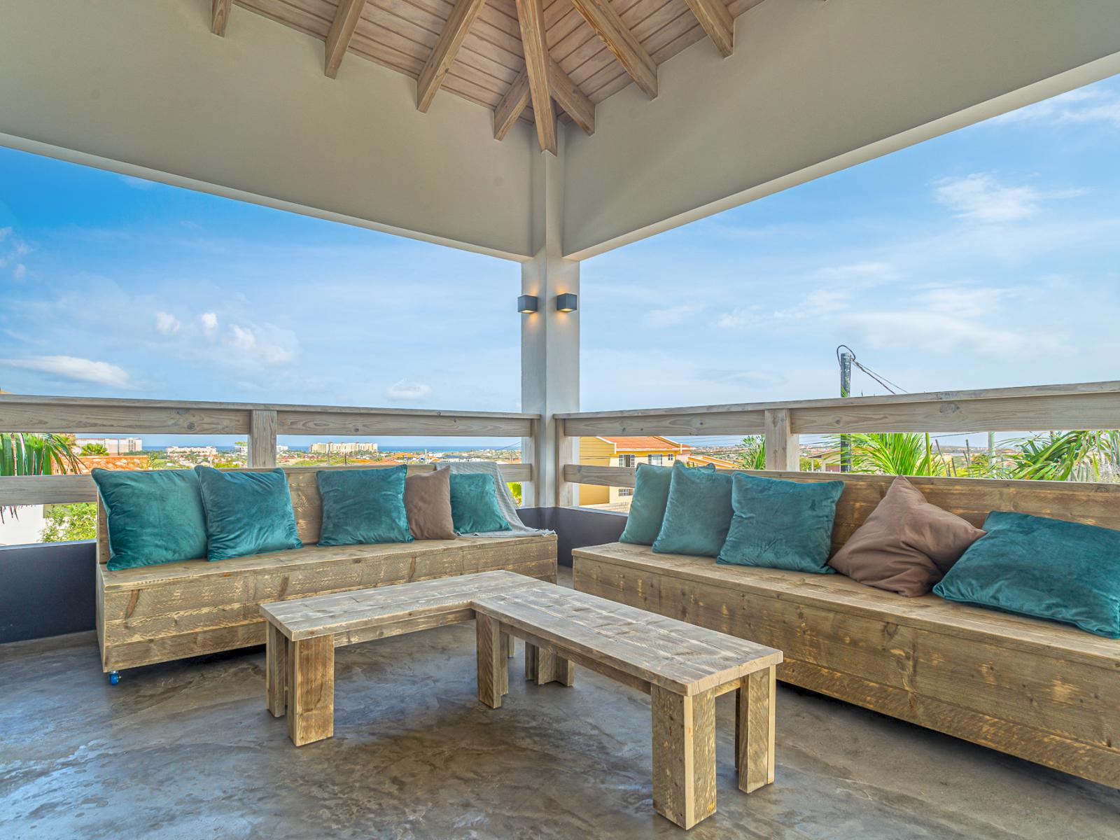 Relax in style with our outdoor lounge area on the private balcony, perfect for enjoying serene views.