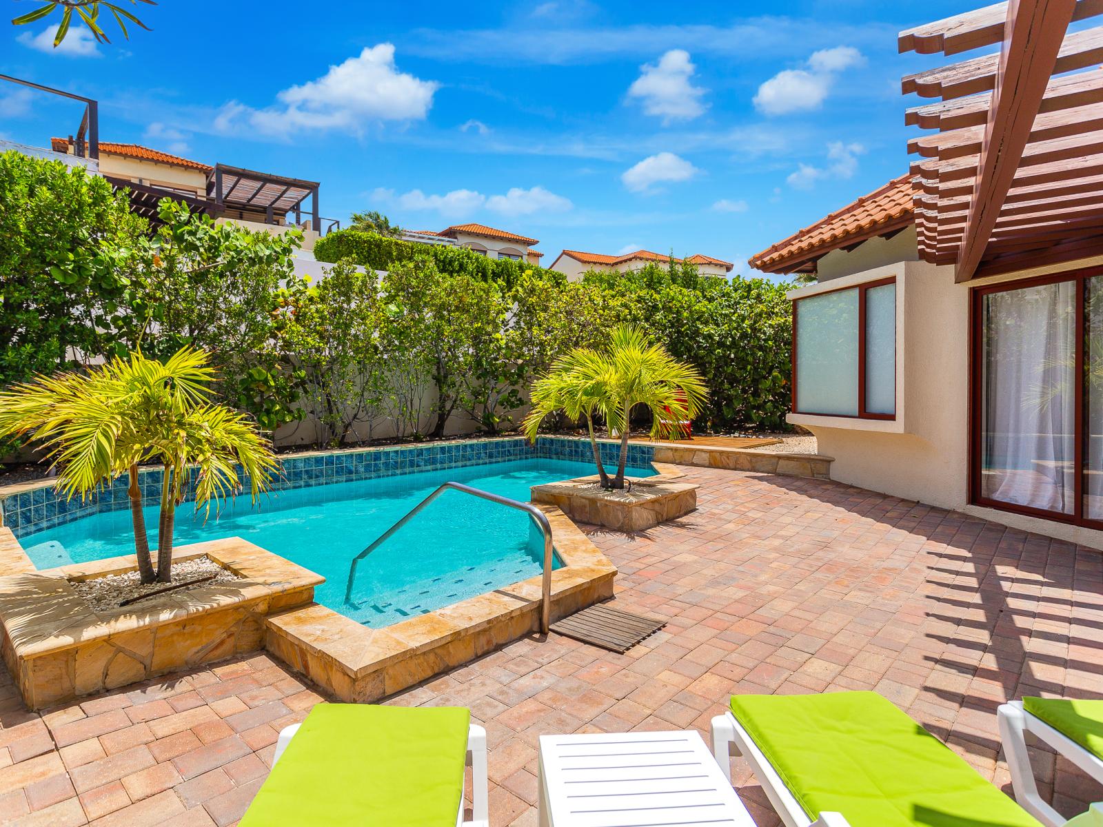 Relax at our expansive pool with refreshing waters and inviting lounge chairs. Perfect for a swim or soaking up the sun, our pool area is ideal for unwinding and rejuvenating.