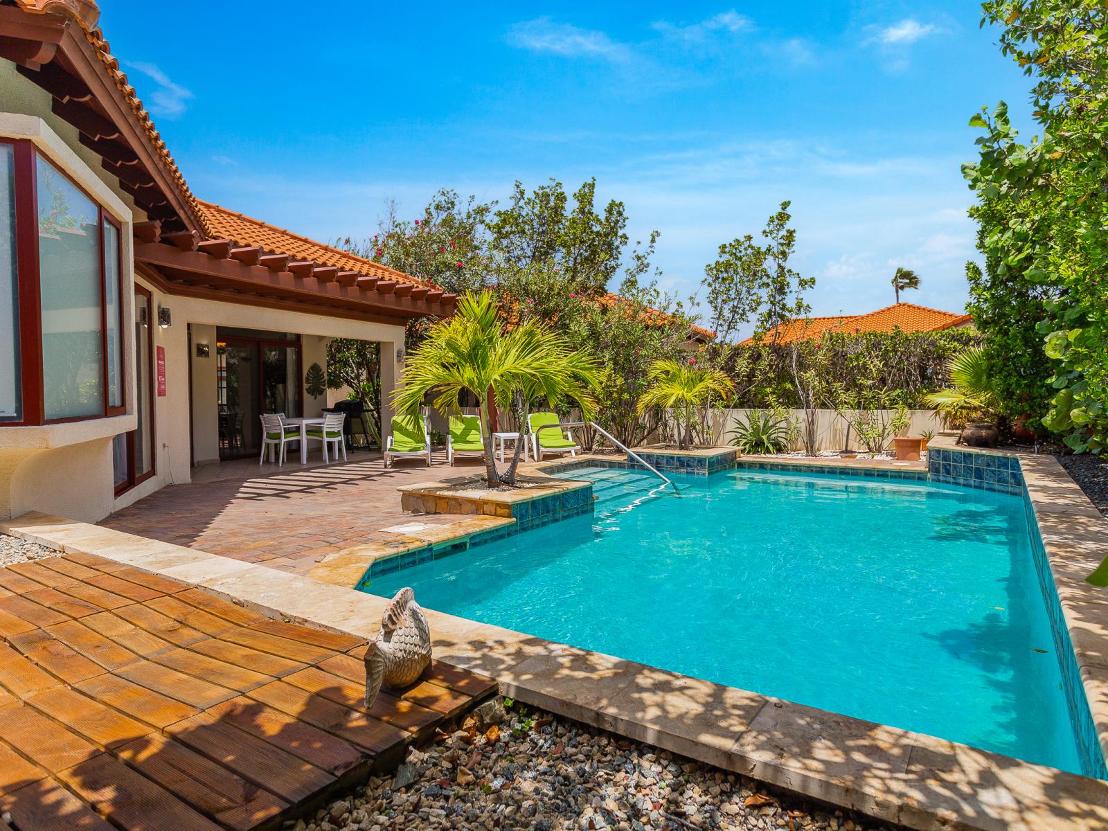 Dive into relaxation at our spacious pool, where cool waters invite you to unwind and refresh. For those seeking respite from the sun, enjoy the option of shaded seating areas where you can lounge in comfort and style.