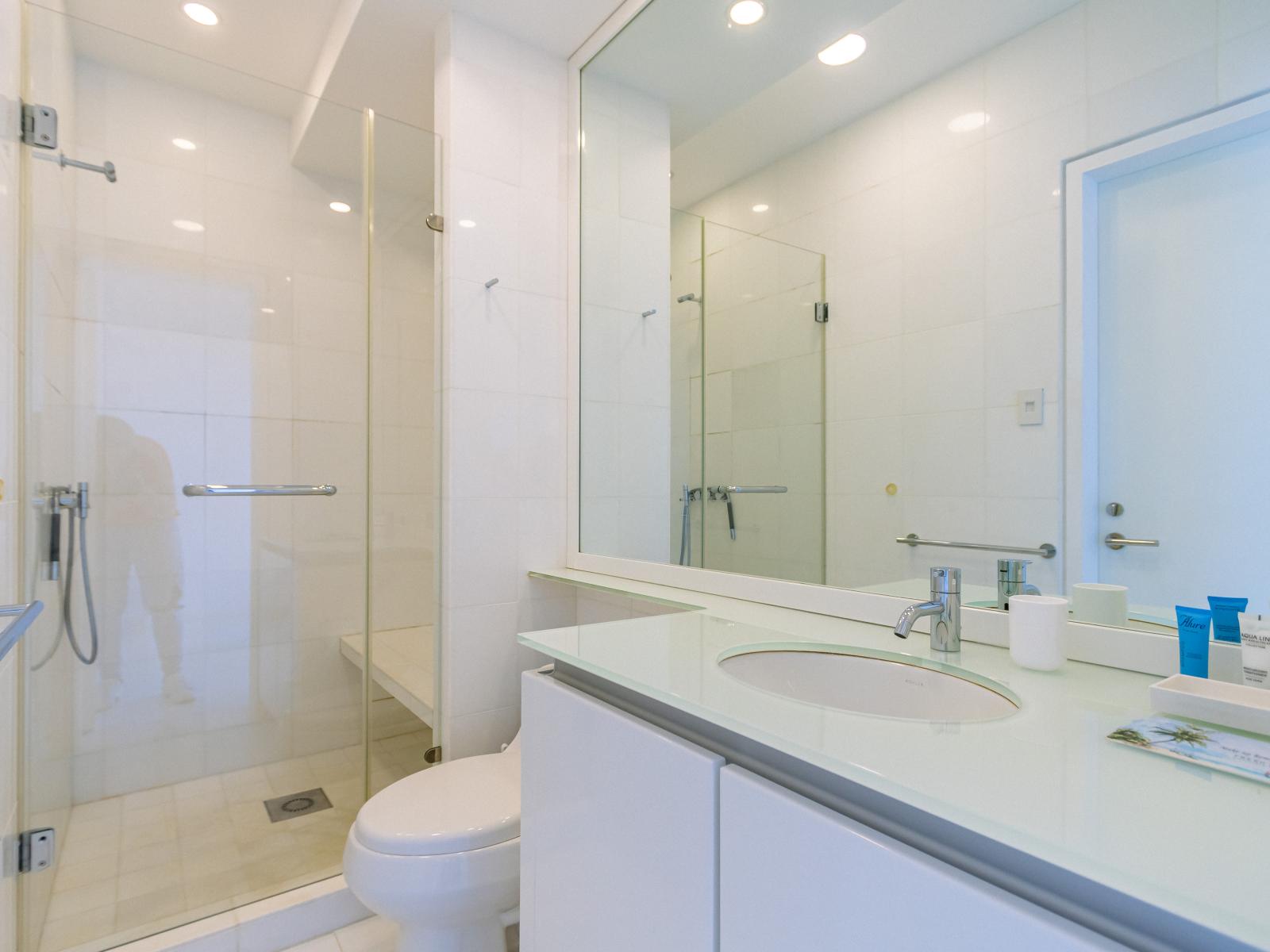 Indulge in a spa-like experience in our stylish bathroom, boasting a rejuvenating walk-in shower for the ultimate in relaxation and convenience.