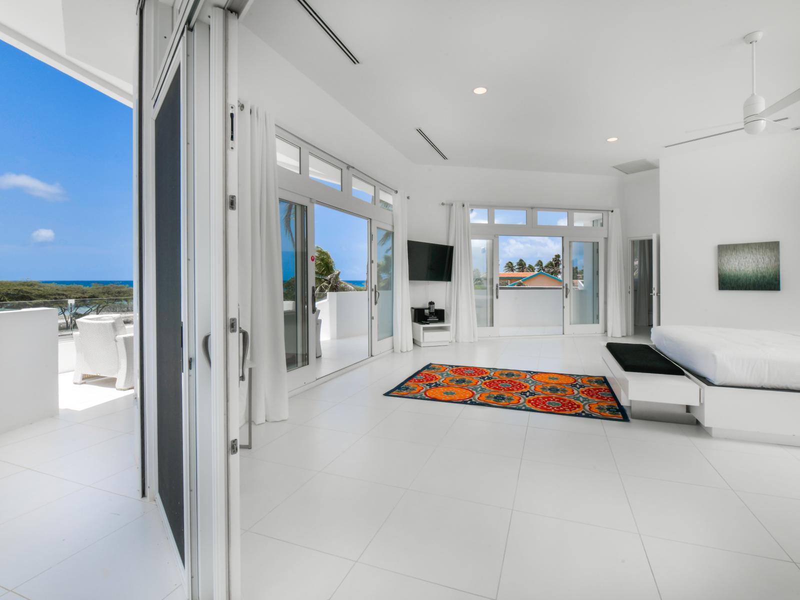 Open the doors to paradise with our sliding doors leading to the balcony from the main bedroom, offering enchanting ocean views that beckon you to embrace the beauty of the natural surroundings.