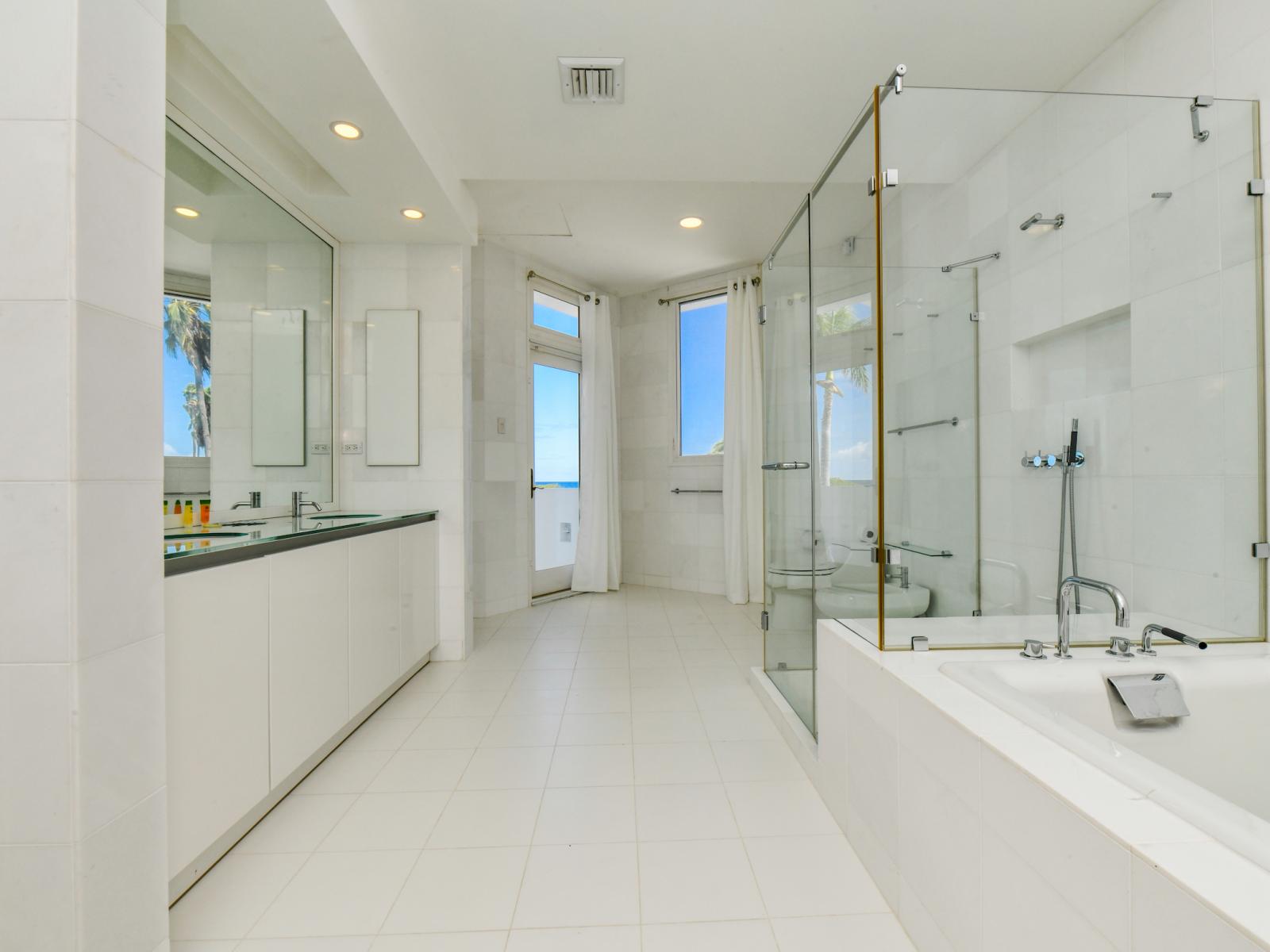 Enjoy the epitome of convenience and luxury in our main bedroom's ensuite bathroom, seamlessly connected to a private balcony, offering the perfect blend of indoor comfort and outdoor serenity.