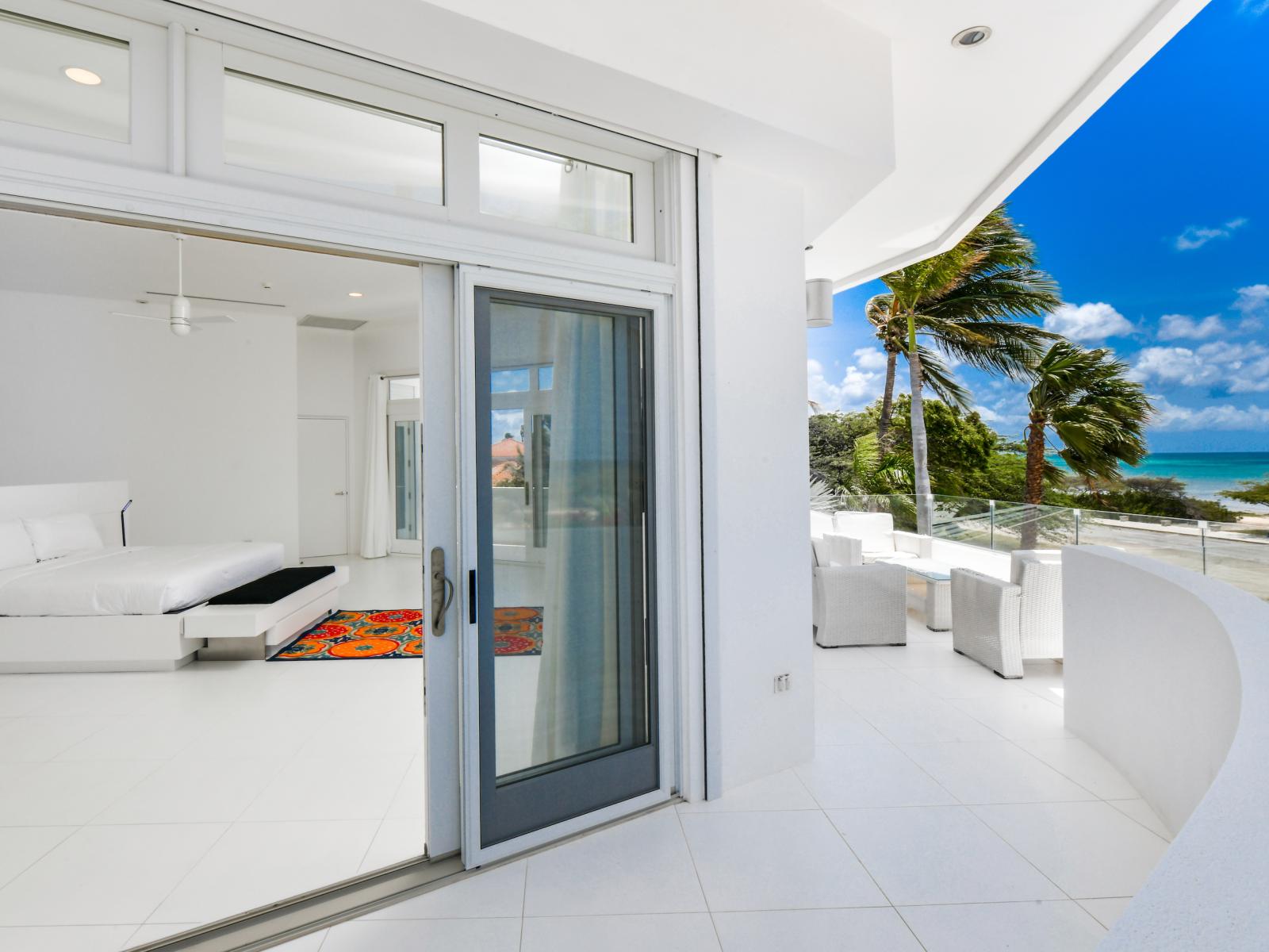 Unwind in luxury on the balcony off the main bedroom, where breathtaking vistas and soothing sounds of the ocean create an idyllic escape right at your doorstep.