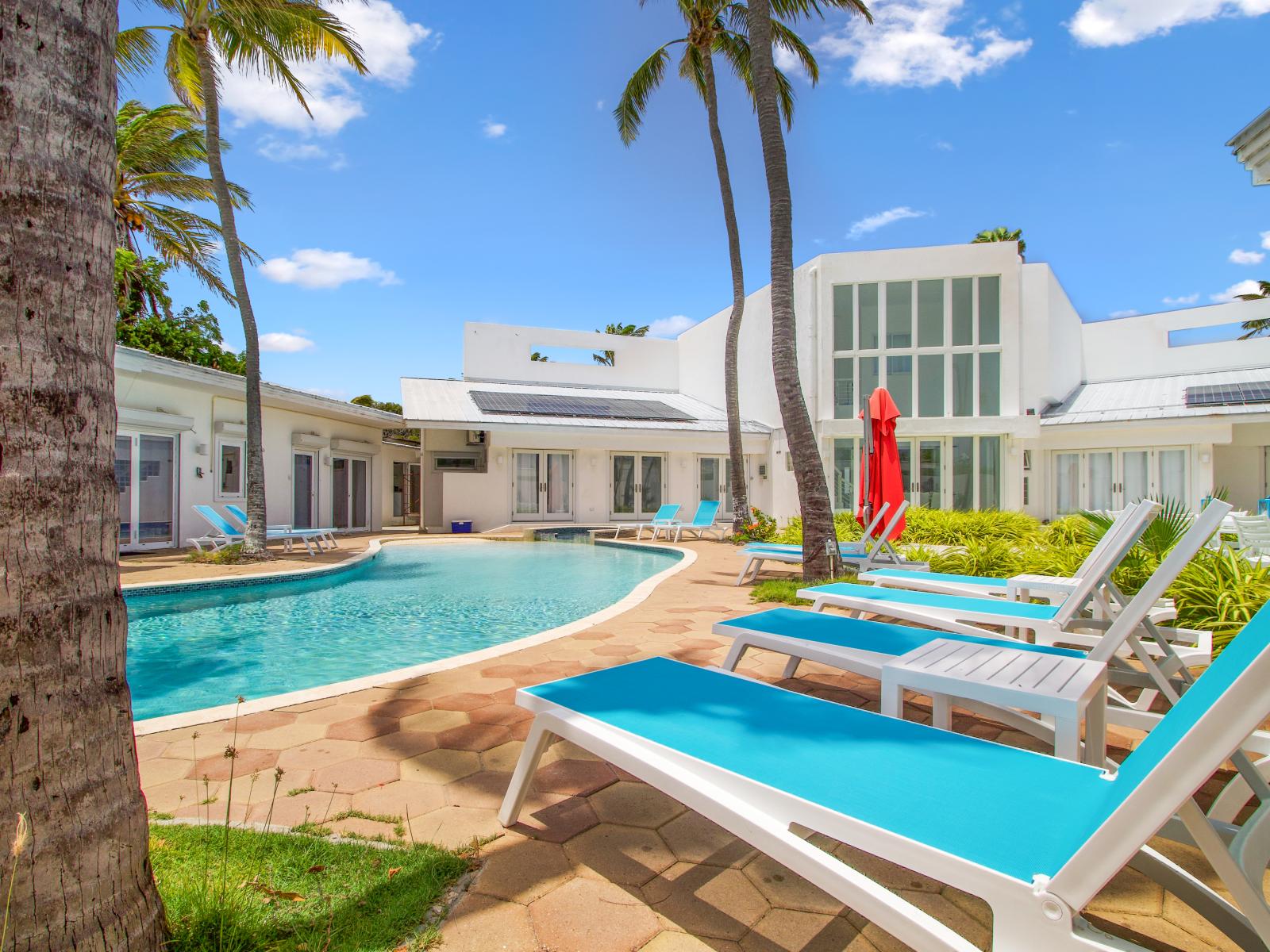 Experience ultimate relaxation at the heart of your vacation! Our poolside retreat is a serene oasis where you can unwind, soak up the sun, and create unforgettable memories. Dive into bliss just steps from your doorstep. 🌴🌊 #PoolsideEscape