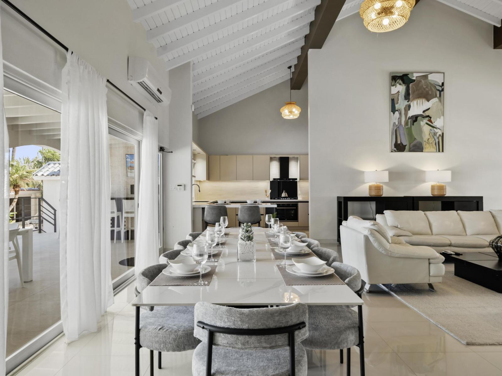 Savor home-cooked meals and delightful conversations at our chic dining table nestled in the heart of the living room.