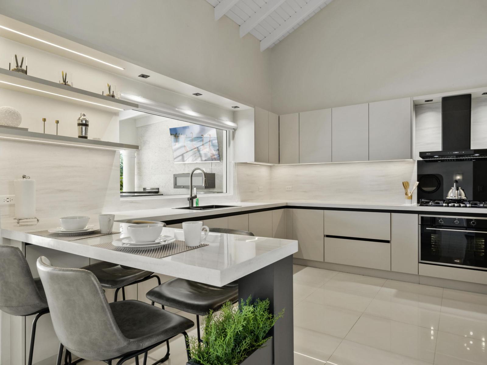 Start your day right in our inviting kitchen, complete with a convenient breakfast bar perfect for enjoying your morning coffee or a quick bite before heading out to explore.