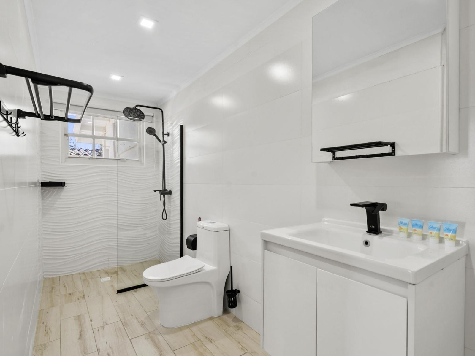 Attached bathroom with a walk in shower