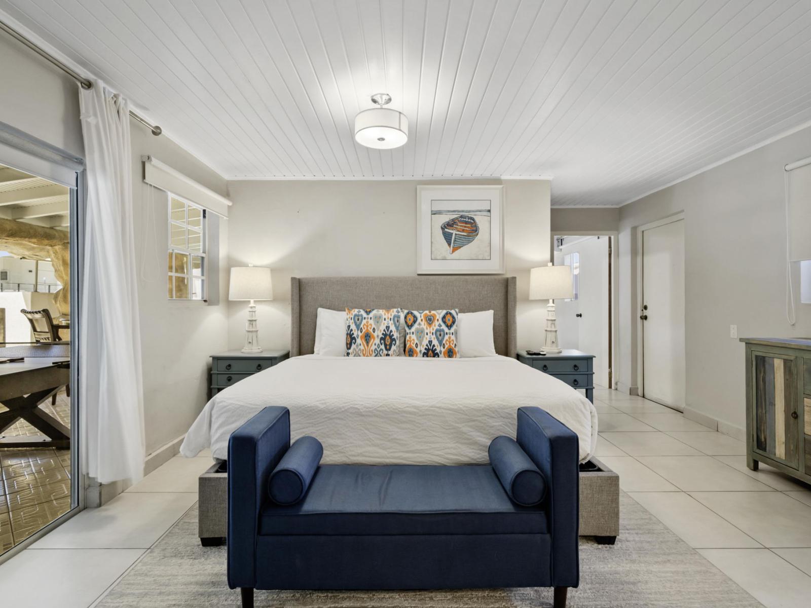 Experience the epitome of comfort and luxury in our serene bedroom sanctuary. With a plush king bed, a sleek TV for entertainment, and a convenient attached bathroom, every detail is designed to ensure your stay is nothing short of extraordinary.