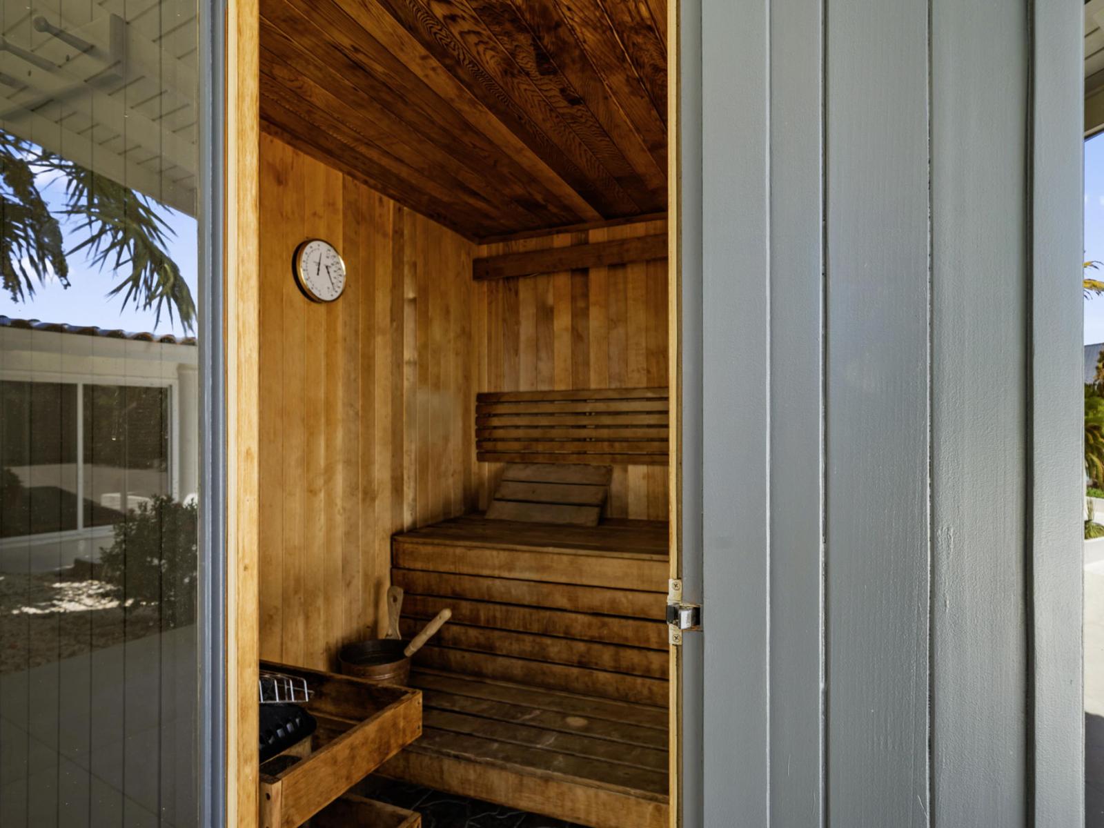 Experience the luxury of outdoor relaxation with our sauna nestled on the side of the villa at the 'Rock' apartment! 🌿 Immerse yourself in the tranquil surroundings as you unwind in the soothing heat. Book now for an unforgettable escape.