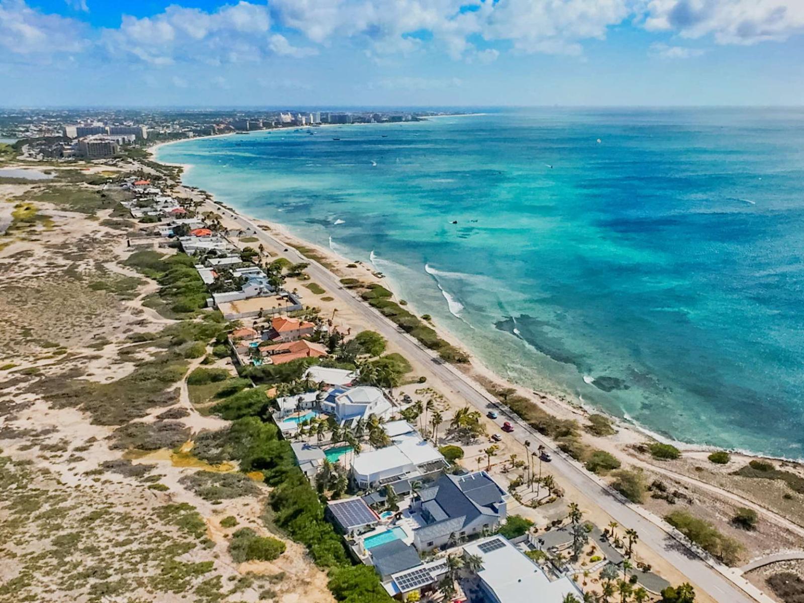 Discover the pinnacle of coastal living on the prestigious Malmok strip. Our villa boasts a prime location, offering unparalleled access to the stunning shores and vibrant energy of Aruba's renowned coastline.