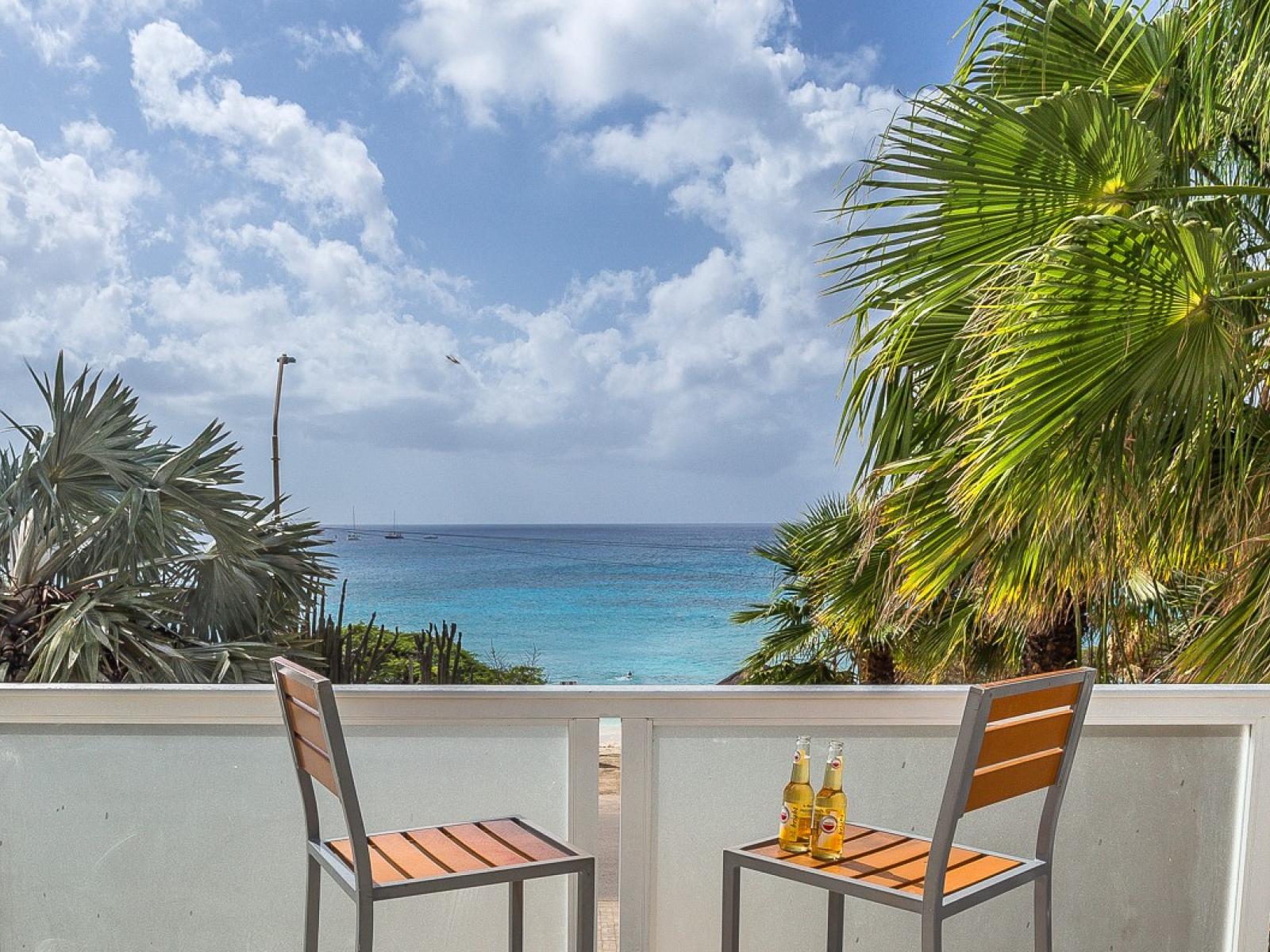 Phenomenal Balcony of the villa in Noord Aruba - Sip, savor, and soak up the scenery from our outdoor seating haven - Panoramic views of the surrounding area - A splash of nature's beauty - Ocean Views