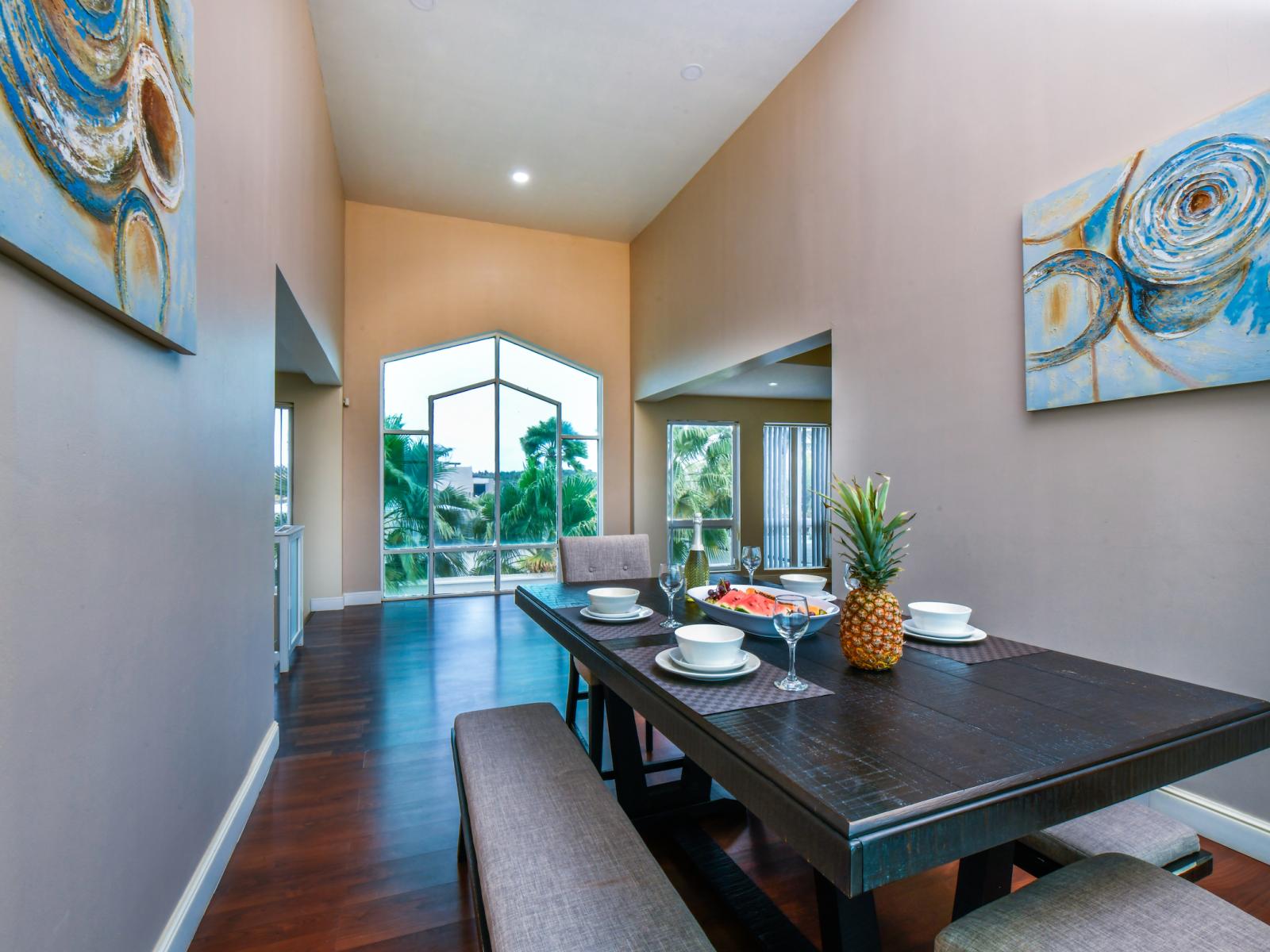 Dining table on the second floor with view of the ocean