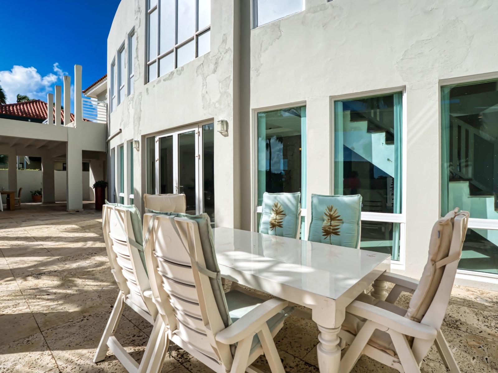 Savor the joys of outdoor dining with our poolside dining table, offering the perfect setting for enjoying delicious meals and creating unforgettable memories under the open sky.