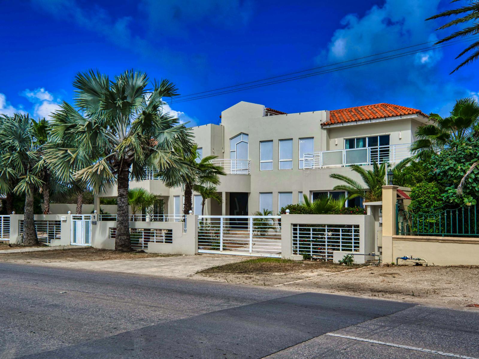 Villa from the street view, footsteps away from the beach