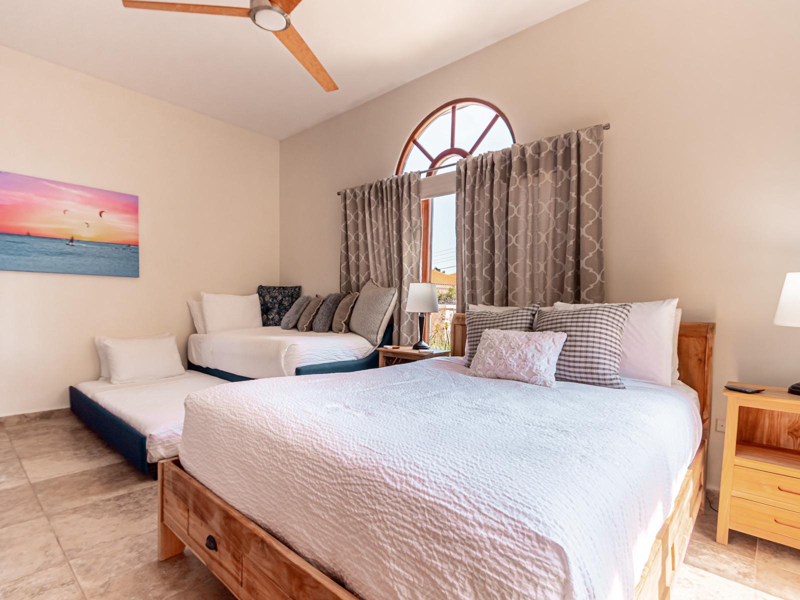 Majestic bedroom of the 3BR House in Noord Aruba - Comfy beds - Elegantly designed room - Beautiful painted walls with decoration - Majestic table lamps - Neat and clean linen - Large windows with beautiful views