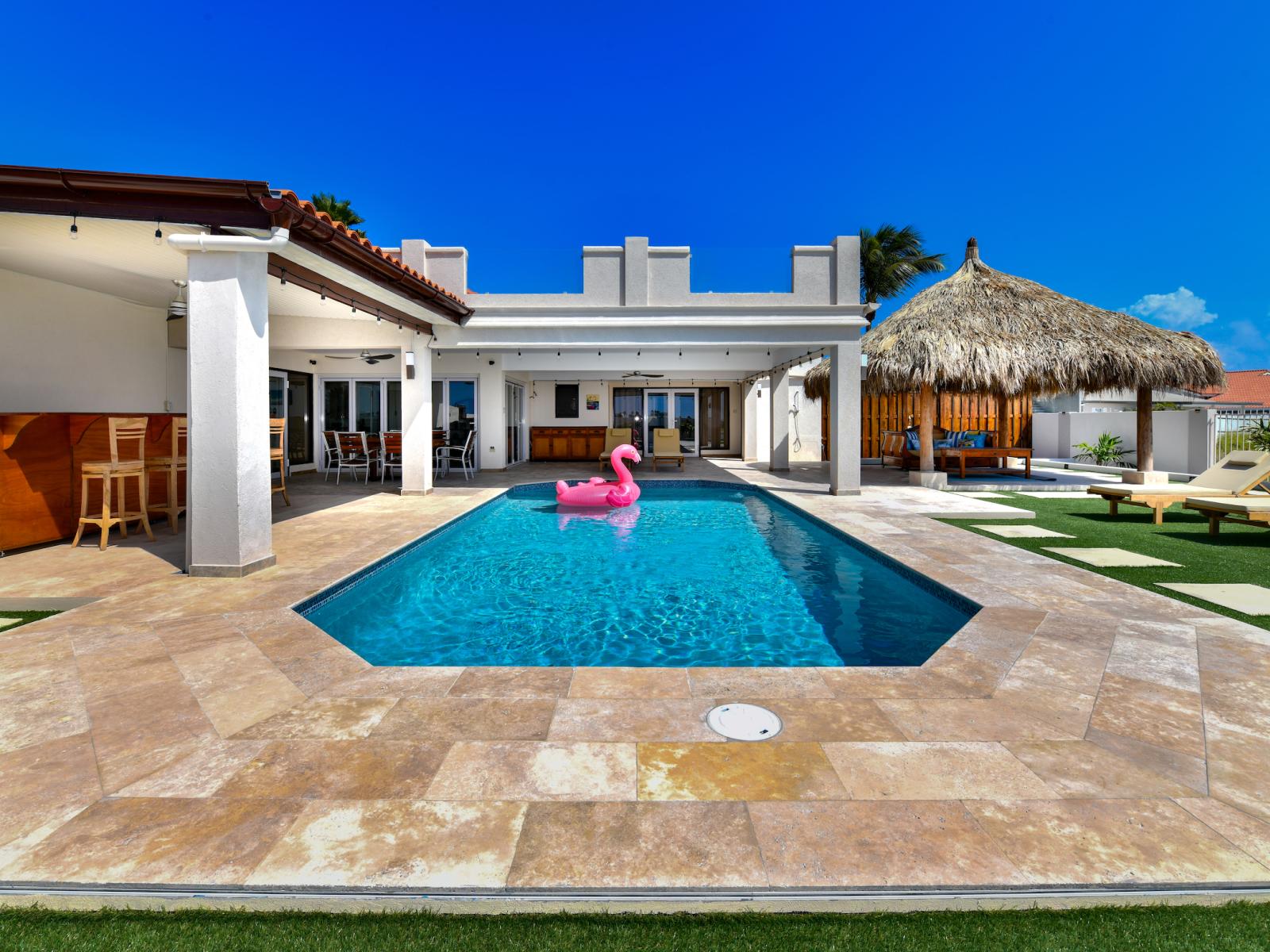 Sublime Pool of the 3BR House in Noord Aruba - Cosy beach chairs available - Dive into refreshing poolside escape - Immerse yourself in the cool elegance of our pool - Experience ultimate relaxation in our poolside paradise