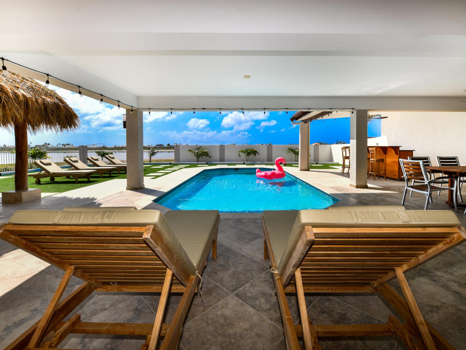 Amazing Pool of the 3BR House in Noord Aruba - Cosy beach chairs available - Dive into refreshing poolside escape - Immerse yourself in the cool elegance of our pool - Experience ultimate relaxation in our poolside paradise