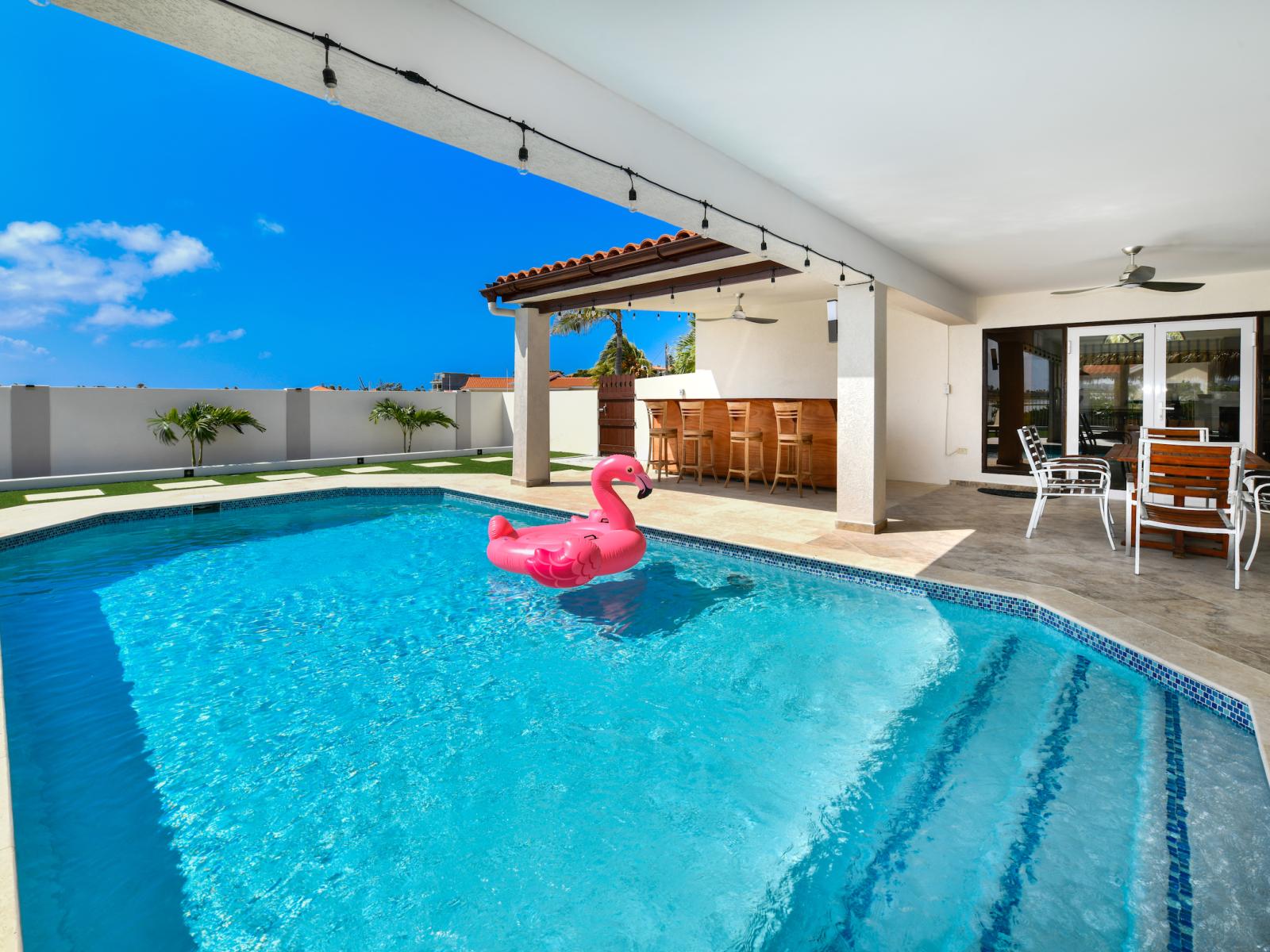 Refreshing Private Pool of the 3BR House in Noord Aruba - Cosy beach chairs available - Dive into refreshing poolside escape - Immerse yourself in the cool elegance of our pool - Experience ultimate relaxation in our poolside paradise