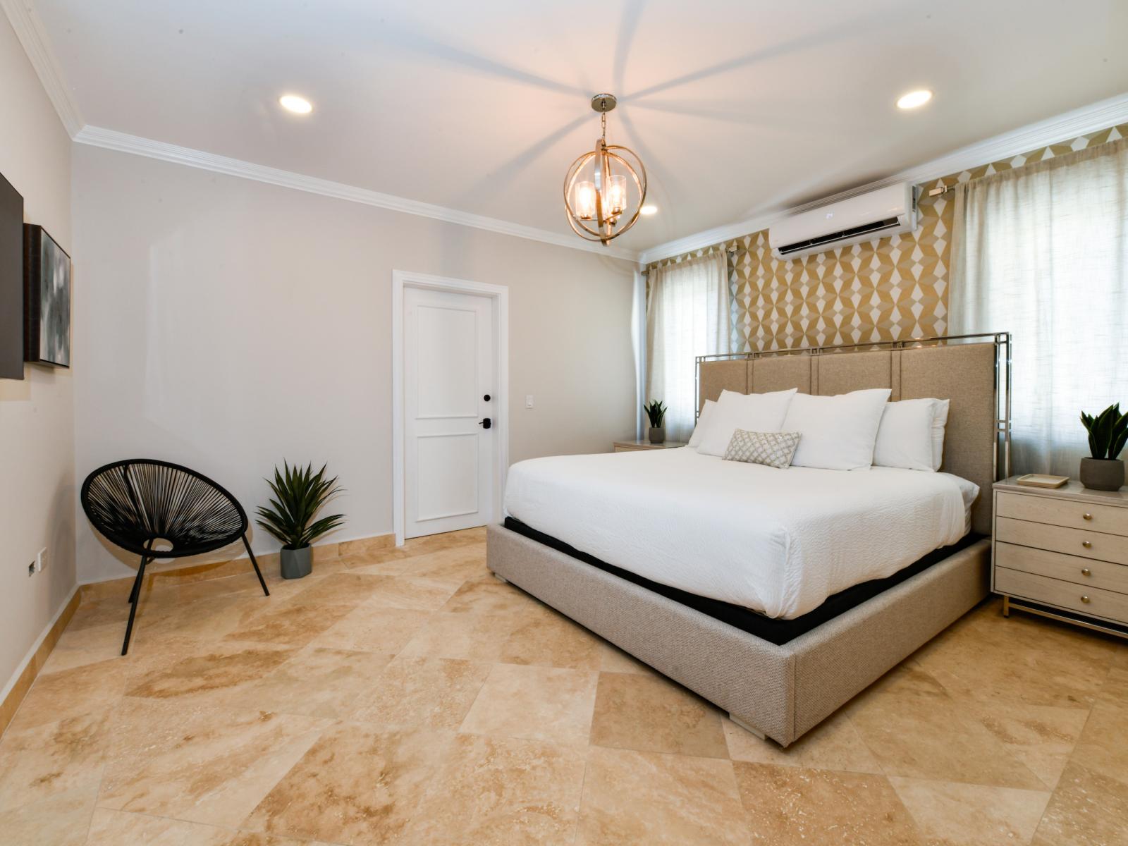 Distinguished Bedroom of the Villa in Noord Aruba near beaches - Smart TV and Netflix - Luxurious bedding for a restful night's sleep - Spacious bedroom offering comfort and style