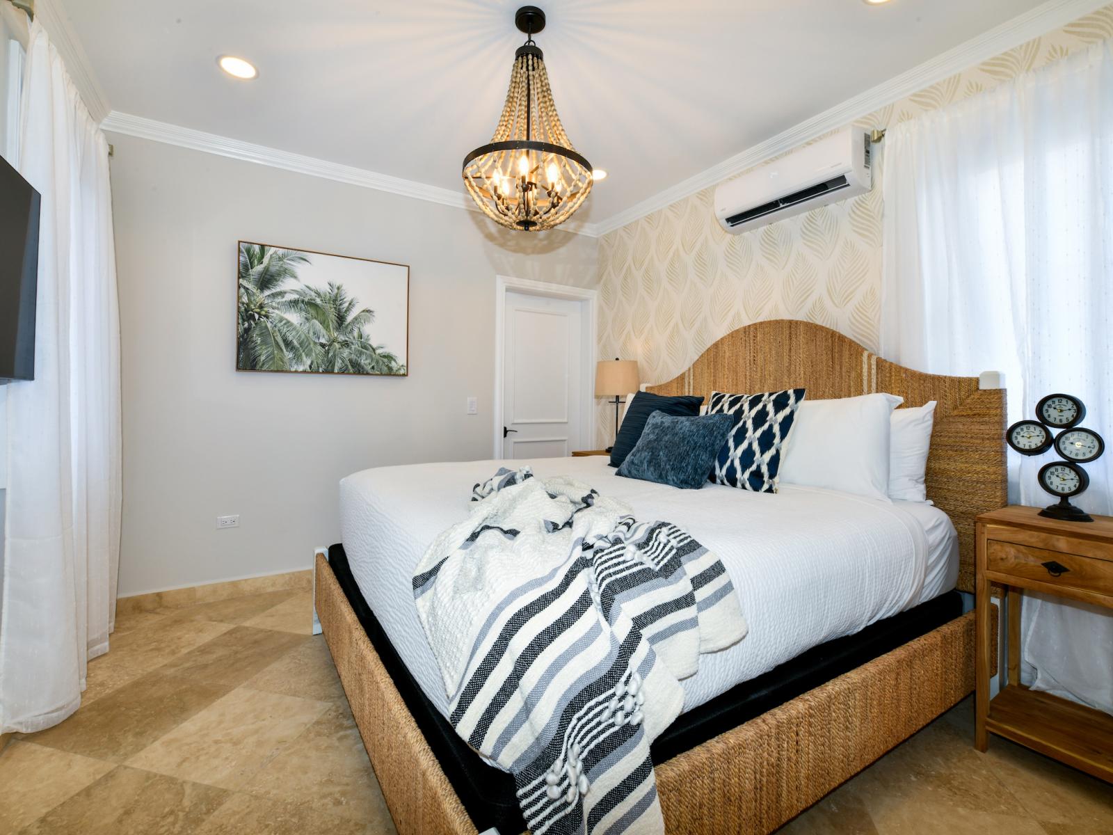 Gorgeous Bedroom of the Villa in Noord Aruba - King size comfy bed - Smart TV and Netflix Well-appointed bedroom with neutral tones for a calming atmosphere - Functional and stylish furniture