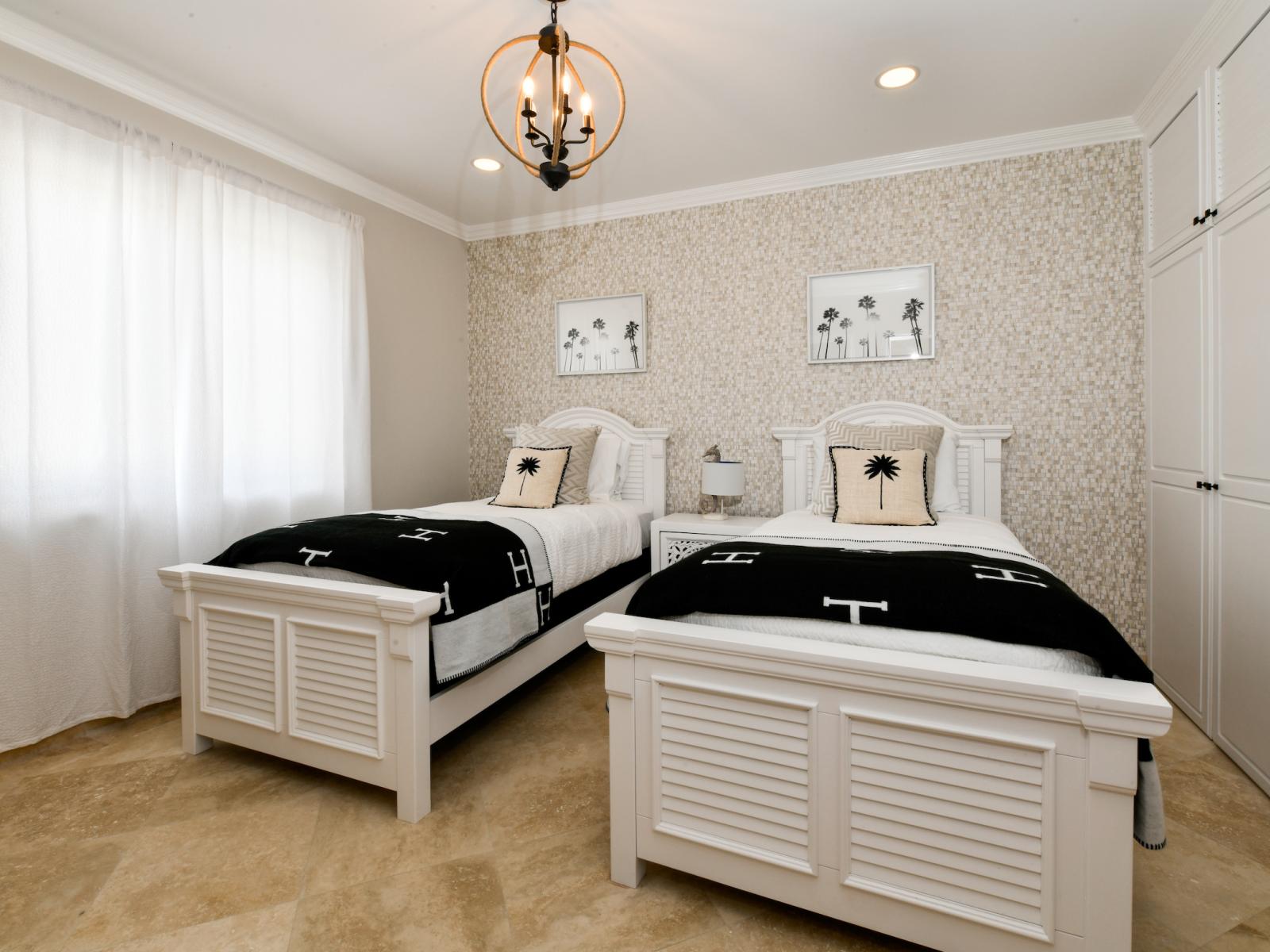 Lofty Bedroom of the Villa in Noord Aruba - Twin comfy bed - Spacious bedroom offering comfort and style -  Storage with full size spacious closets - Elegant Decor