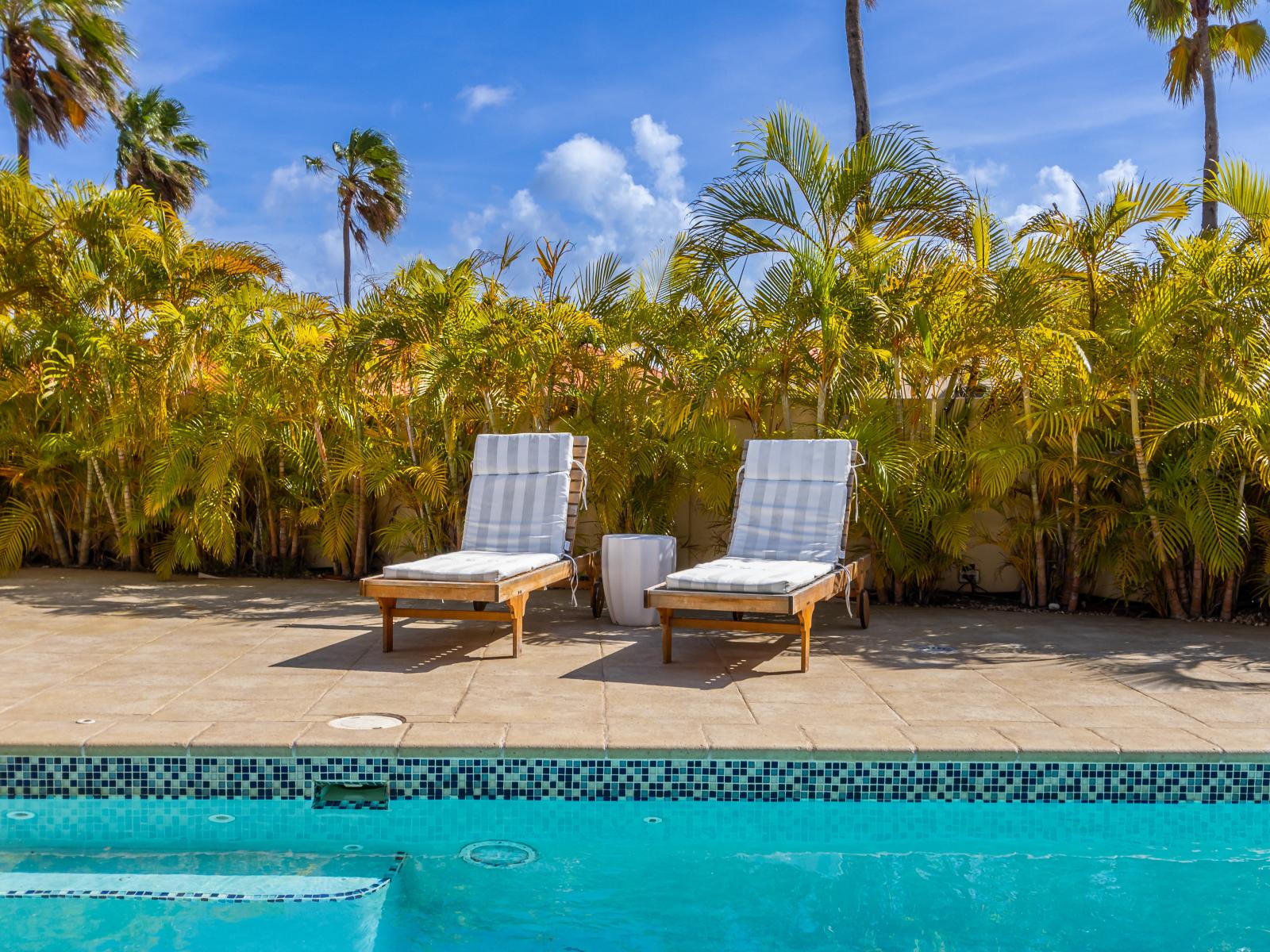 Plenty of chairs for lounging and soaking up the sun.