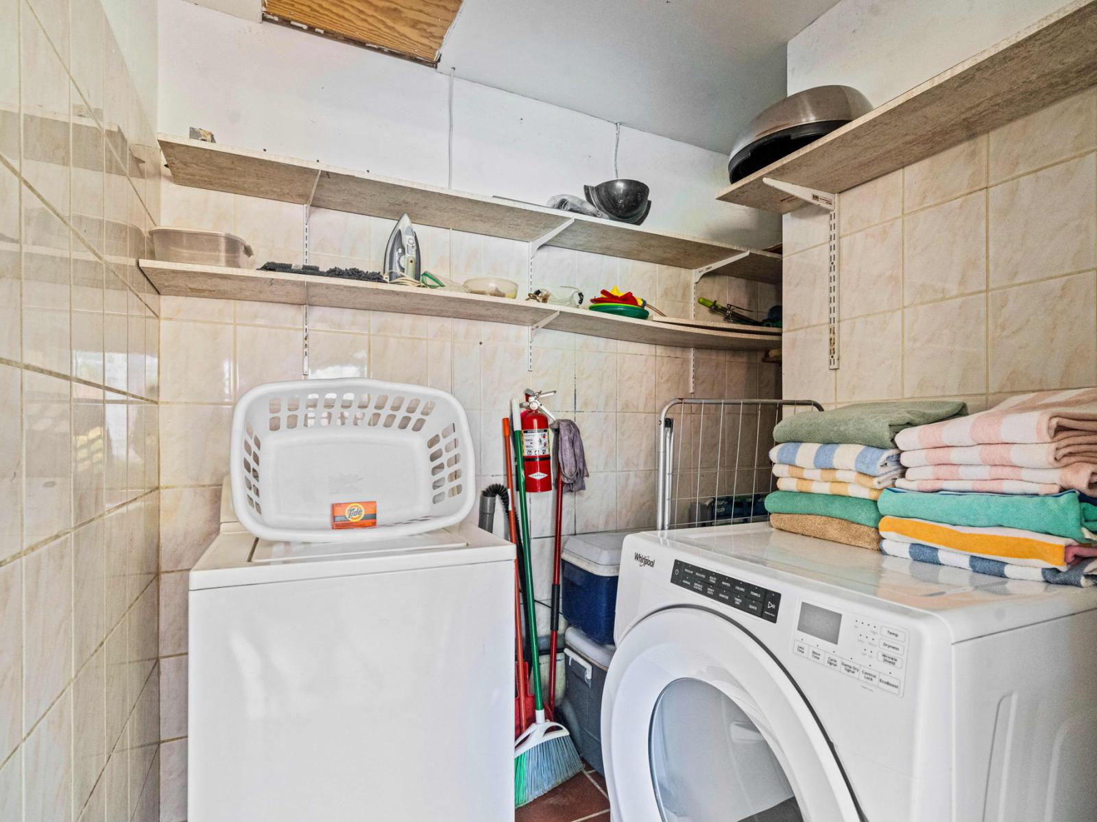 Enjoy the convenience of a dedicated laundry area, complete with modern appliances.