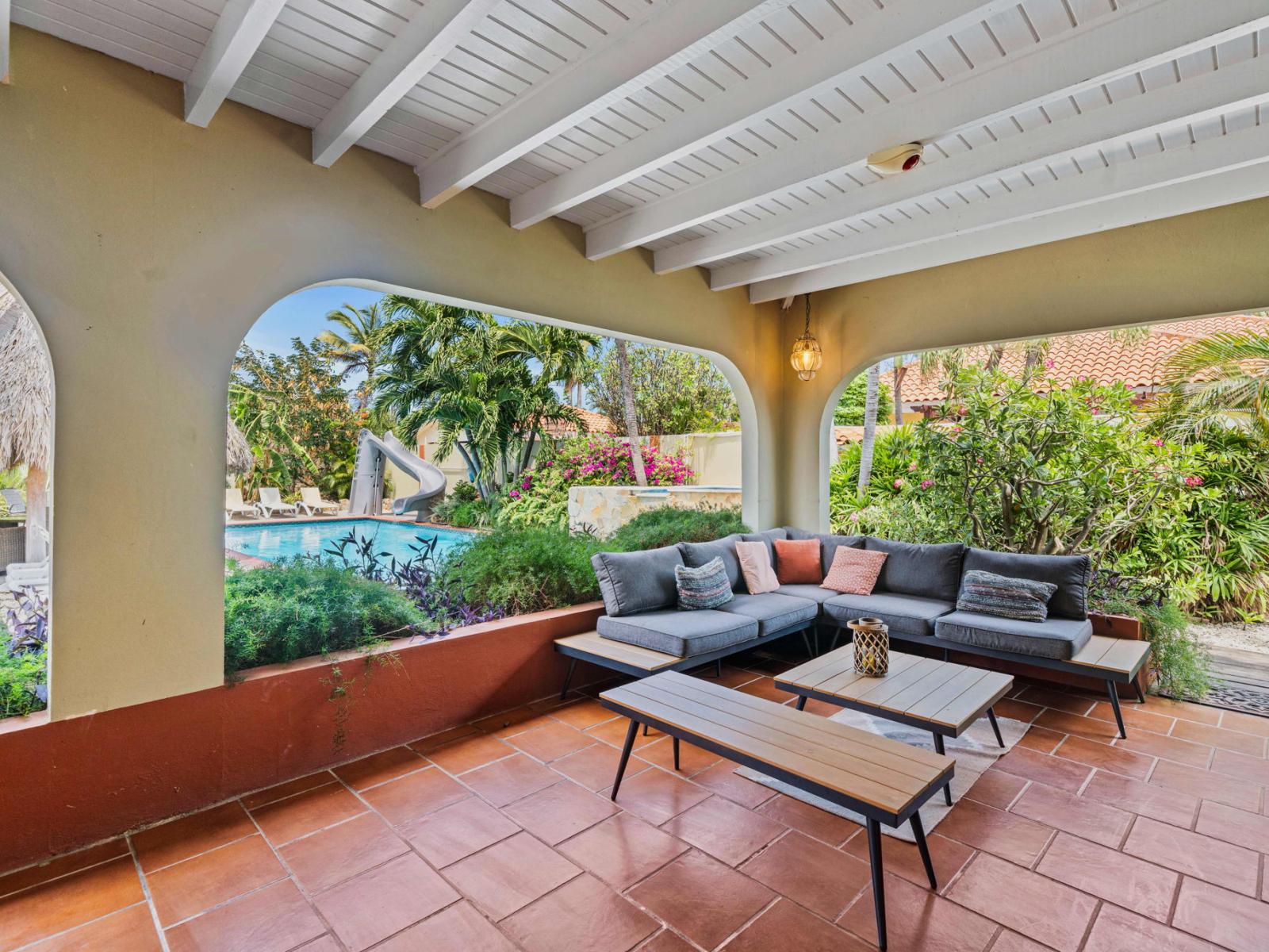 Patio lounge area shaded from the midday sun