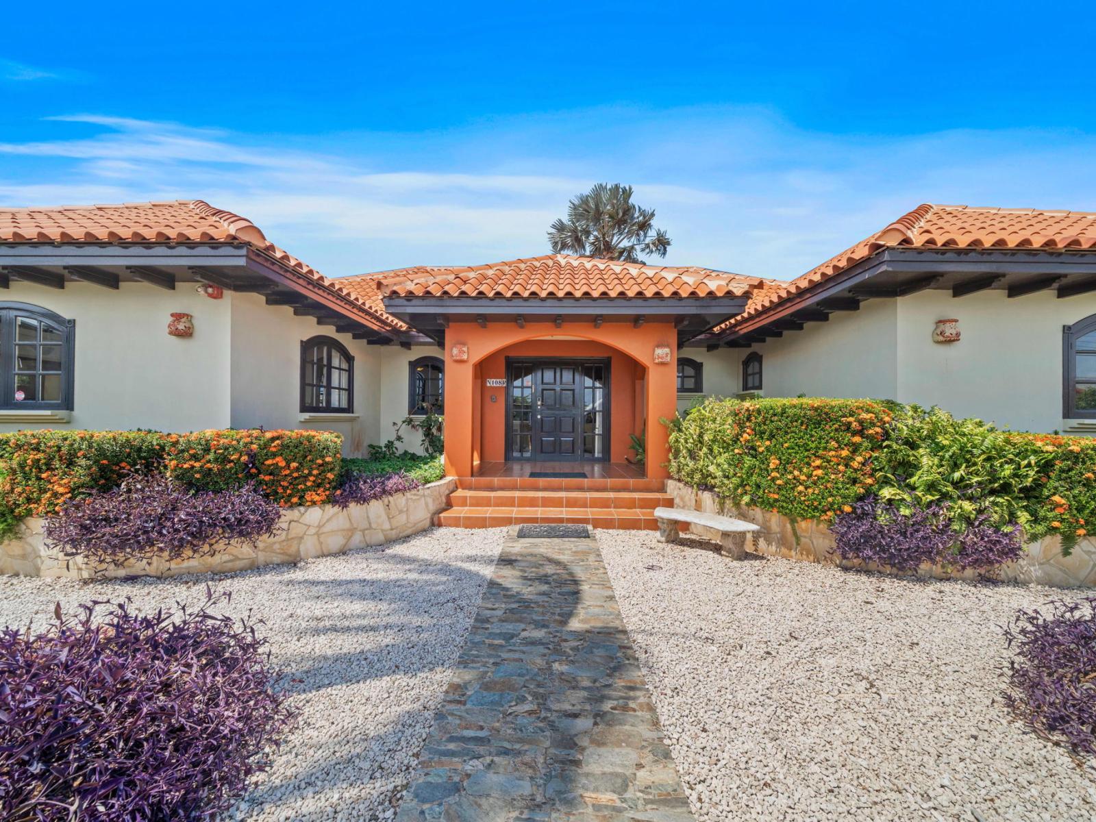 Be greeted by the enchanting front entrance of our home, where your unforgettable vacation begins.