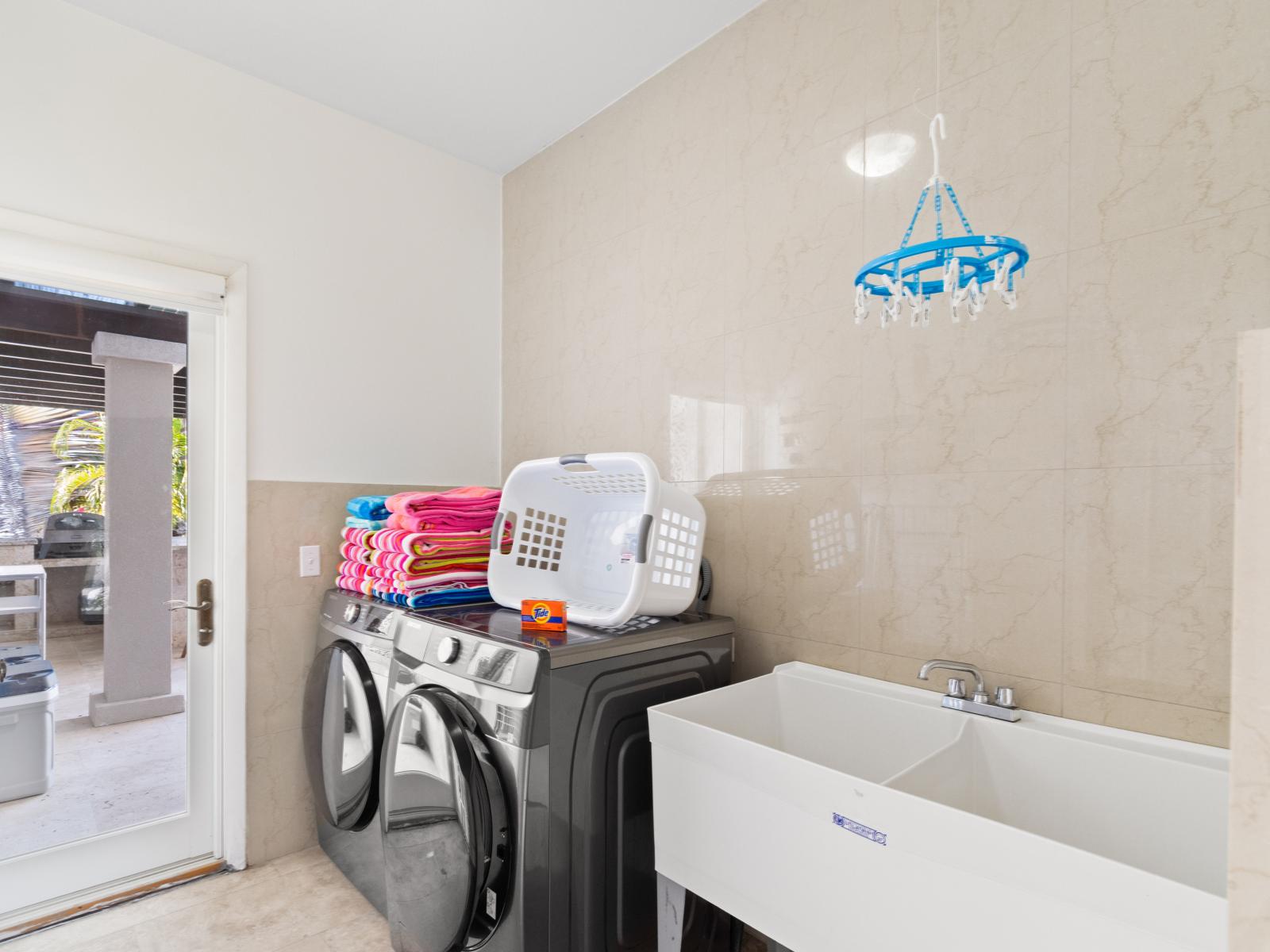 Enjoy the convenience of a dedicated laundry area of the Apartment during your stay. - Keep your vacation wardrobe fresh with our on-site laundry facilities. - Keep your clothes clean and fresh with our on-site laundry amenities.